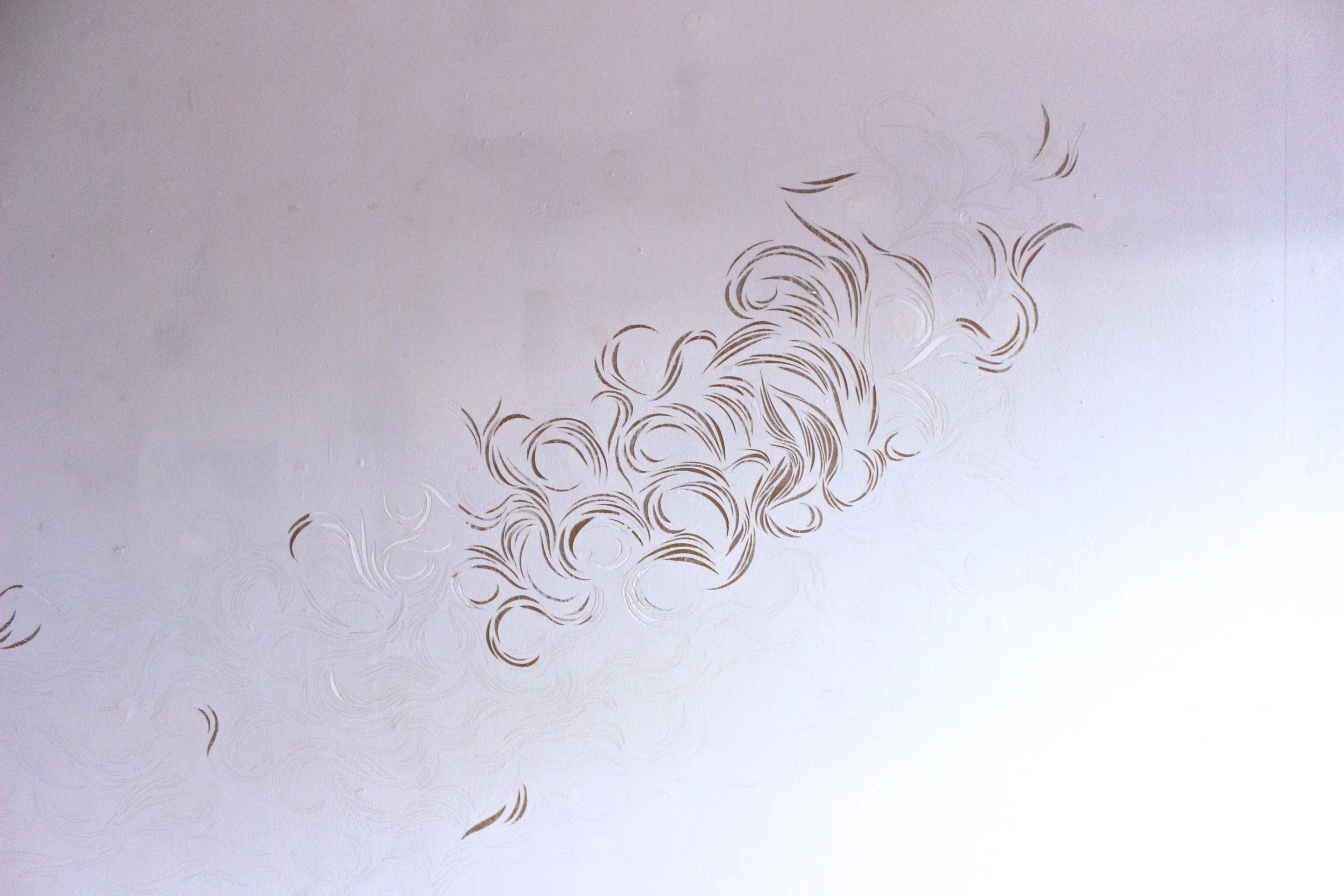  incised scrimshaw into drywall 