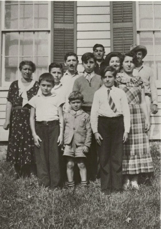 The Salanco cousins, in front of our living room windows.