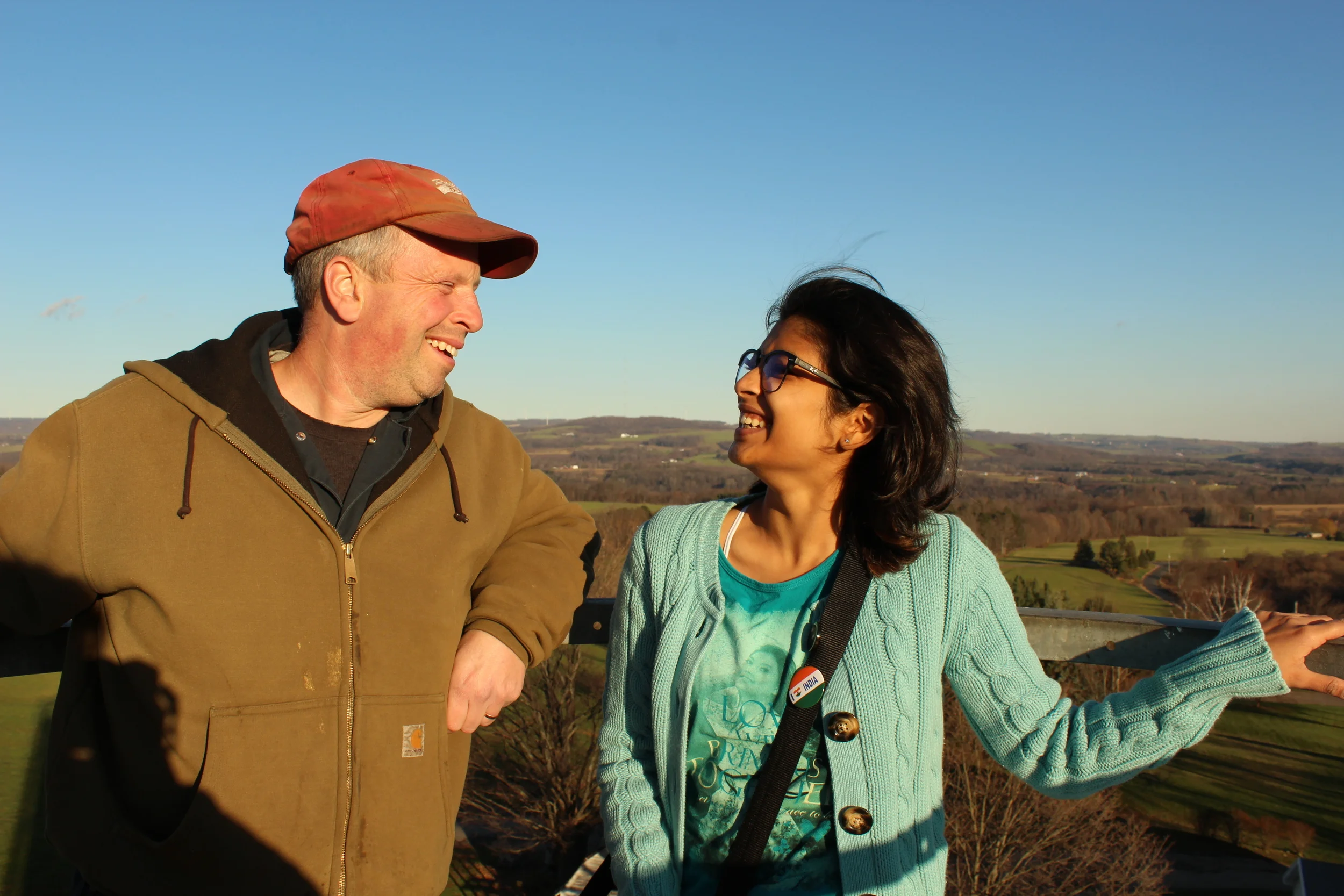 Khushi and Peter atop the silo.