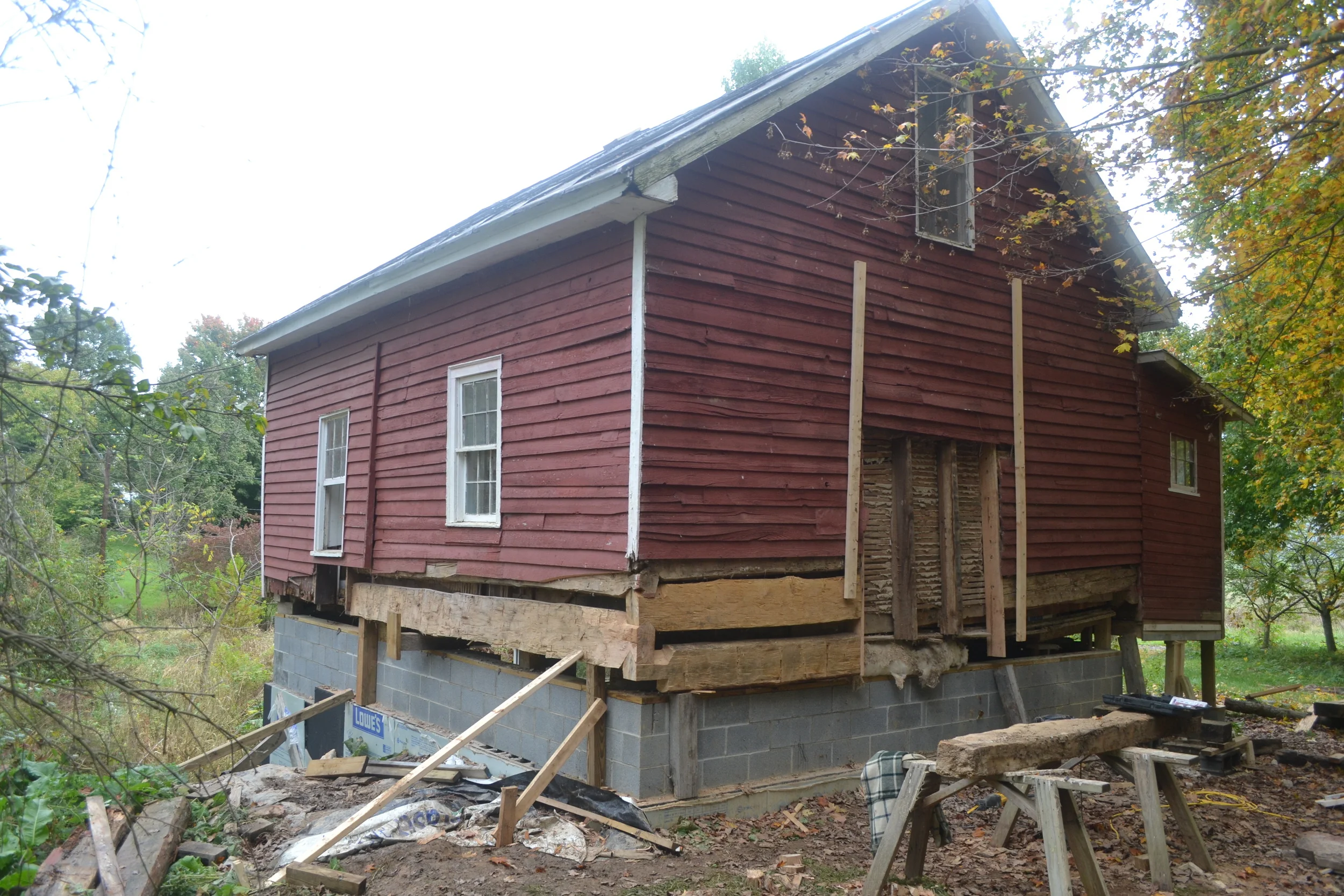  Hand hewed white oak corner being reconstructed underneath this eighteenth century log building. Much about log construction is more complicated than it appears and log reconstruction is considerably more complicated. &nbsp; &nbsp; 