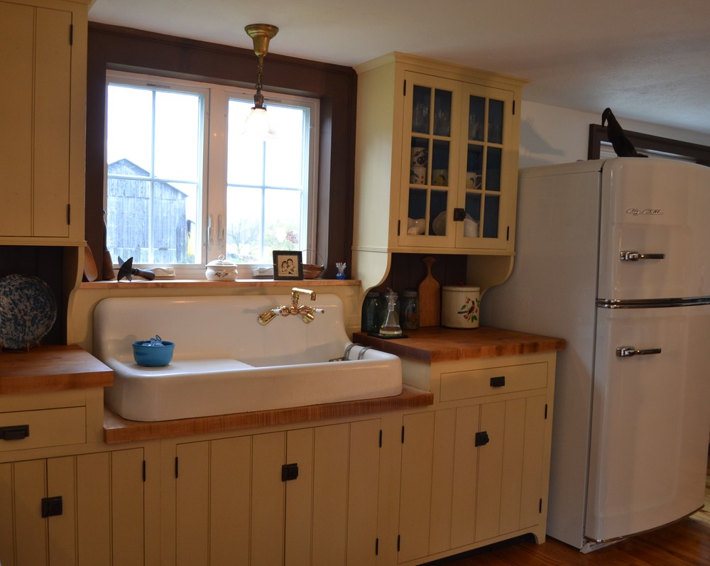 Original 1930s walls uncovered in kitchen-- bead board and 24 studs!