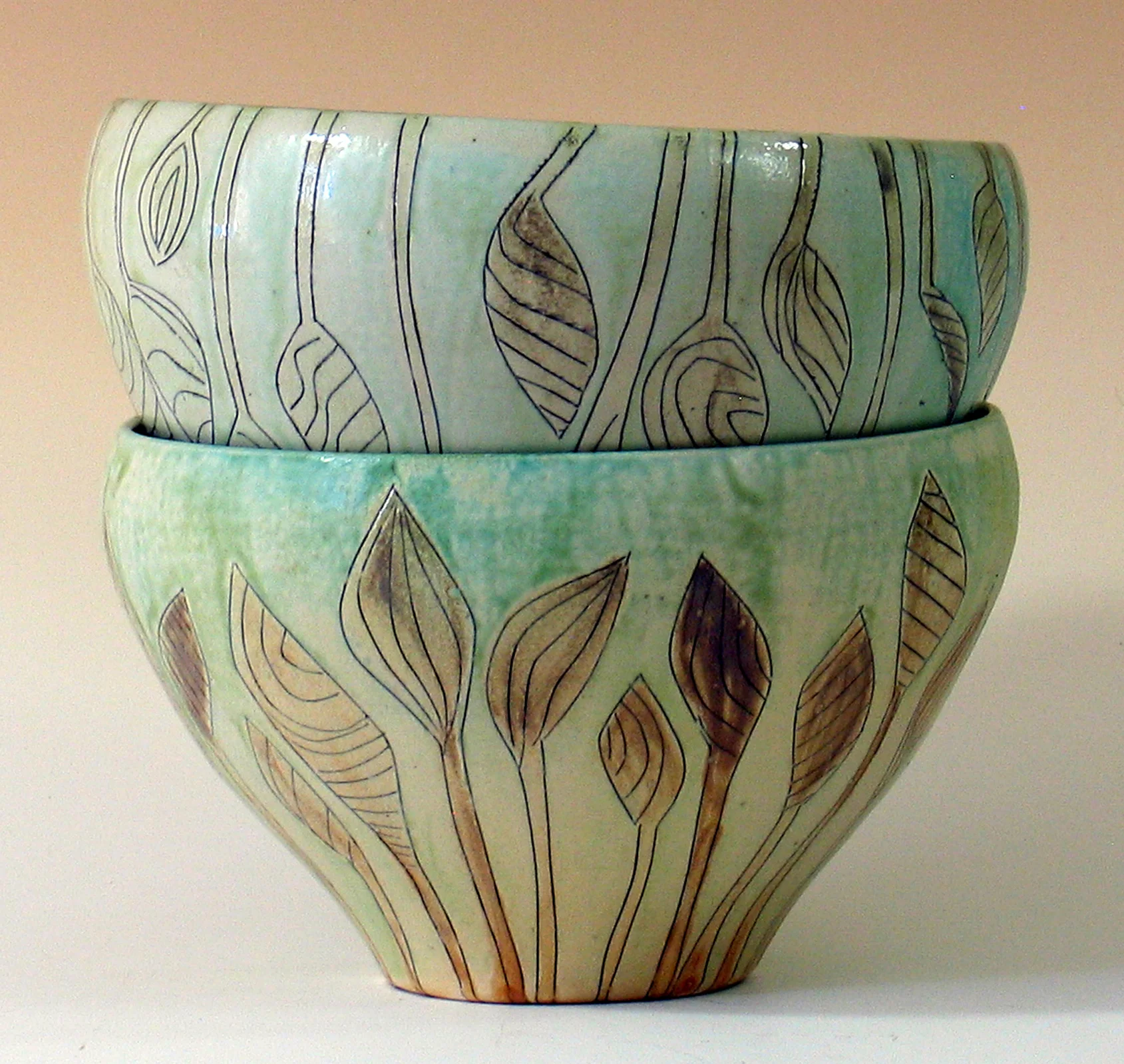 Serving bowls, porcelain, incised and salt fired