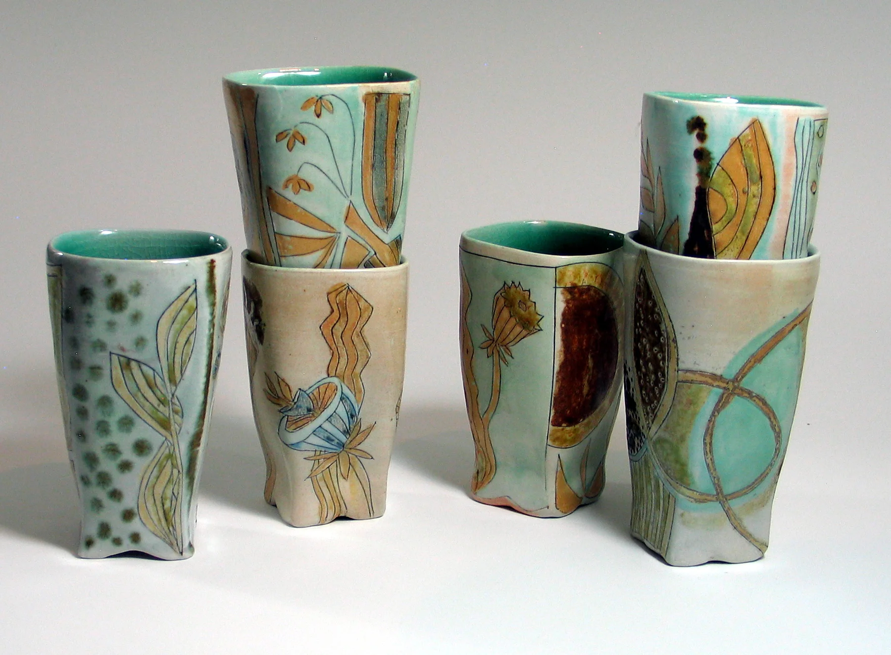 Porcelain salt fired, incised cups
