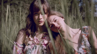 2GirlsInGrass_(400)C.gif