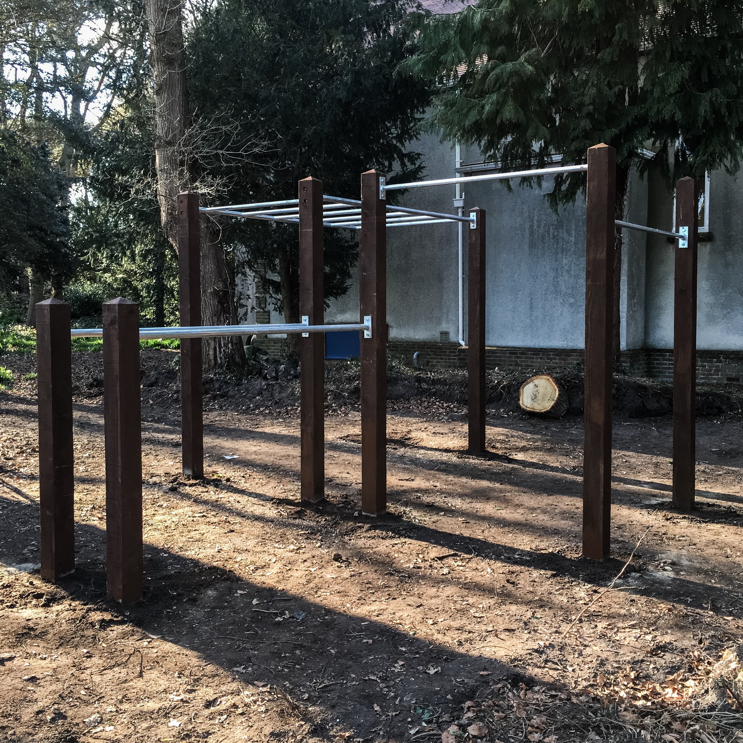 004 2016 garden monkey bars, double pull up bar and dip bars installation.JPG