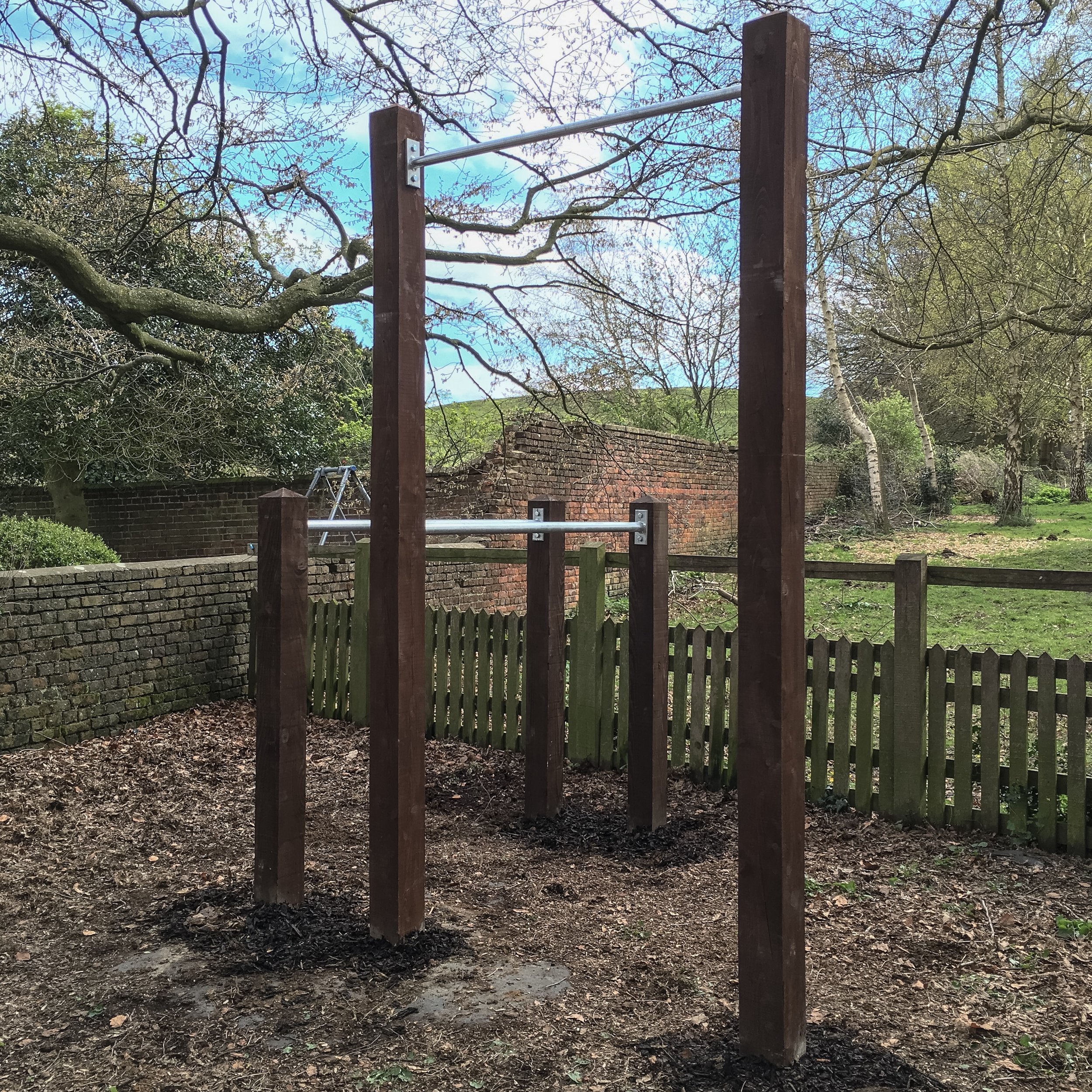 016 2016 garden pull up bar and dip bars installation.JPG