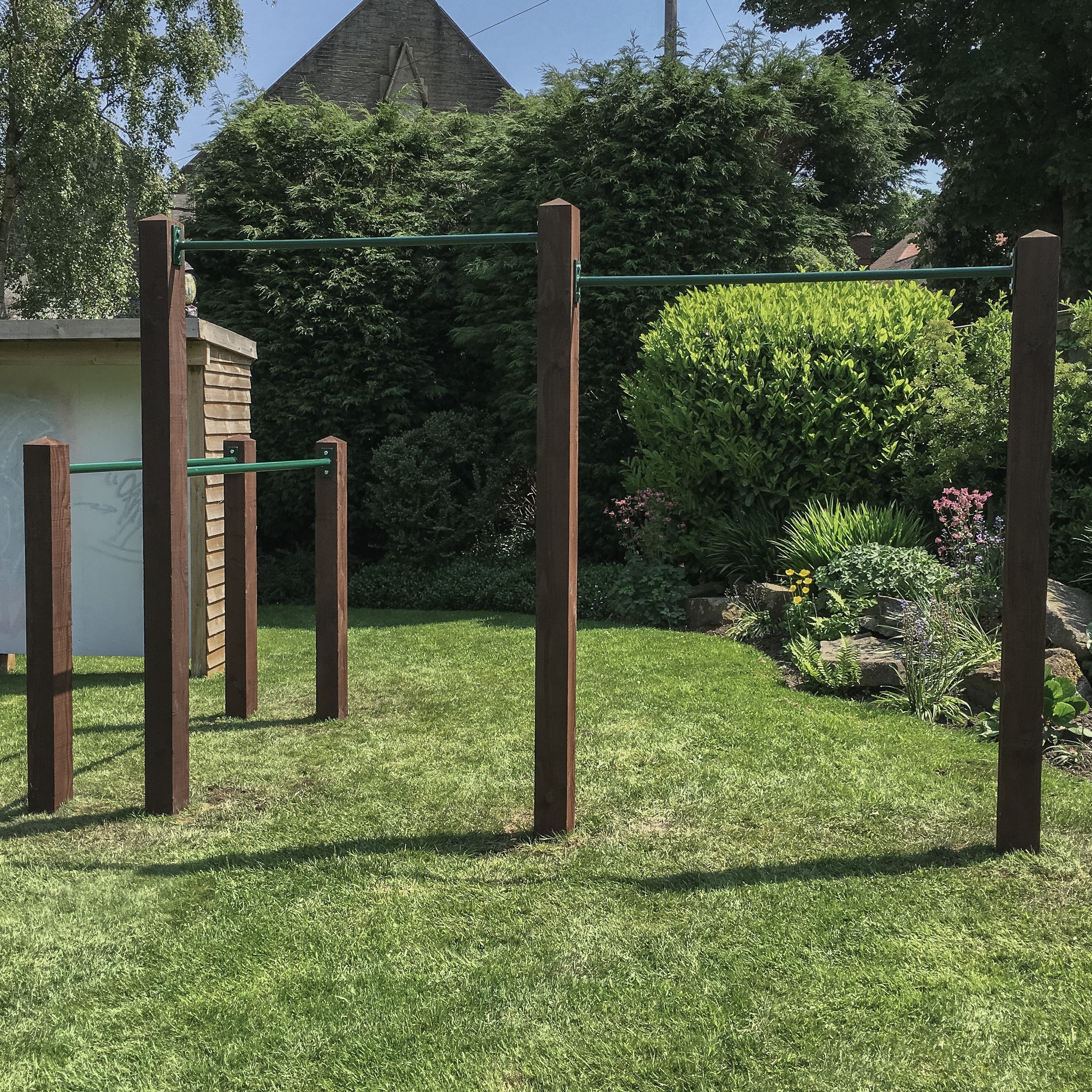 033 2016 garden double pull up bar and dip bars installation.JPG