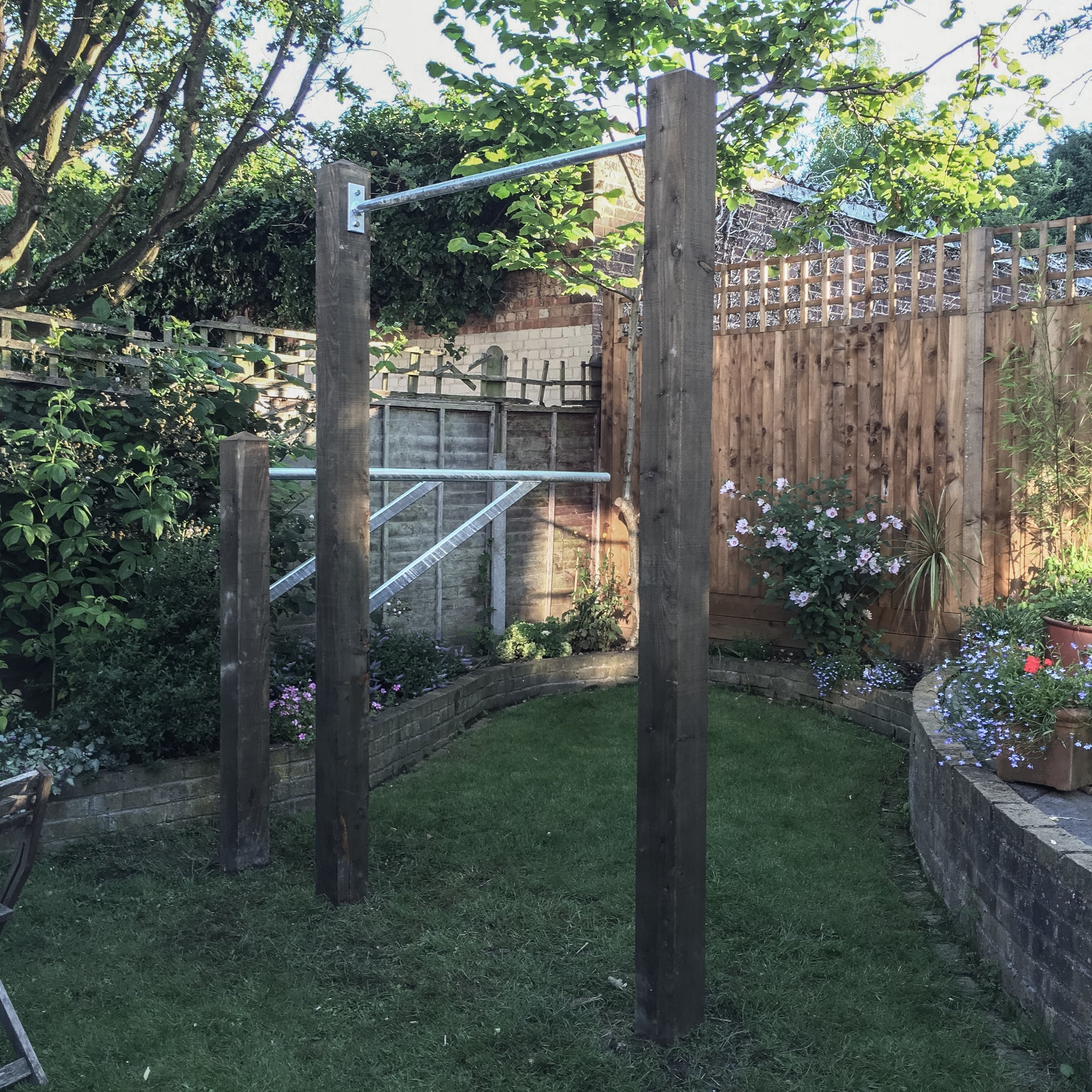 046 2016 garden pull up bar and mounted dip bars installation.JPG