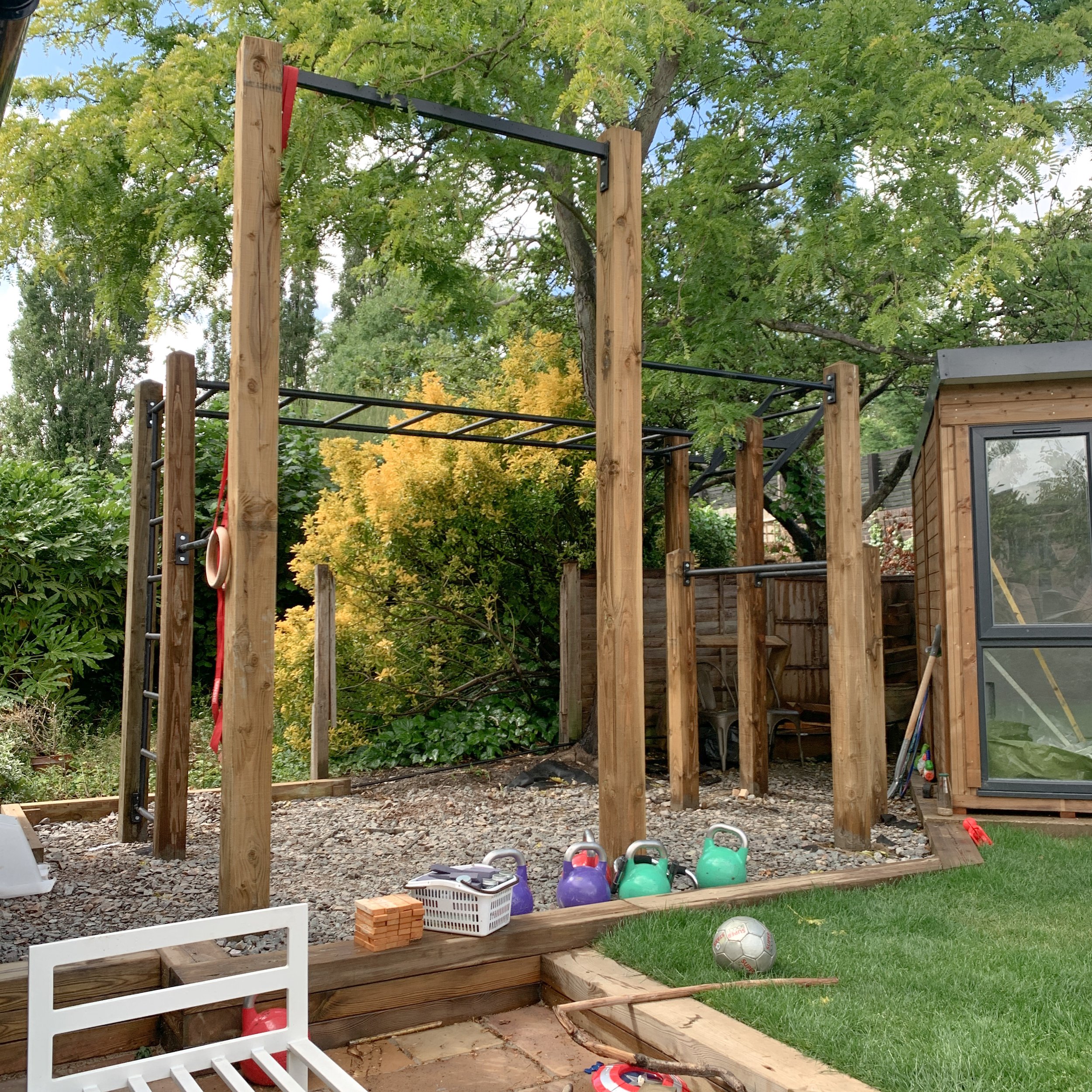 064 2020 garden monkey bars, high bar, pull up bar, wing bar and stall bars installation.JPEG