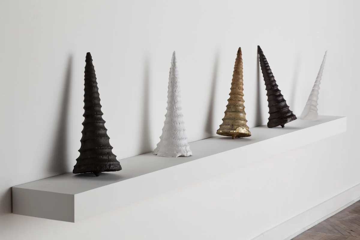 Working through... cast iron, cast paper, turned wood, gold leaf, cast wax, cast glass, 2011