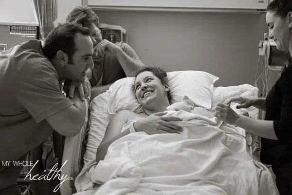 From left: Dr. Cap, my husband, me and baby, Britney - my doula.