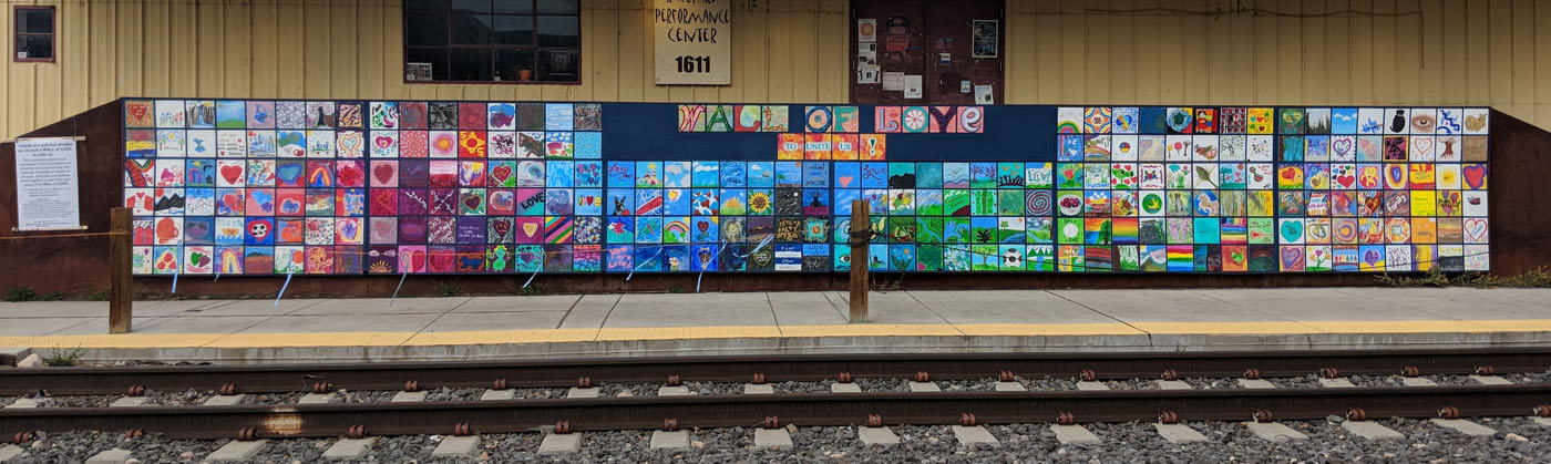  Wall of Love 2018   A community engagement project with Margaret Lubalin, Leela and Robert Marcum. Created with over 250 community members contributing paintings. Santa Fe Railyard and Capital High School. 