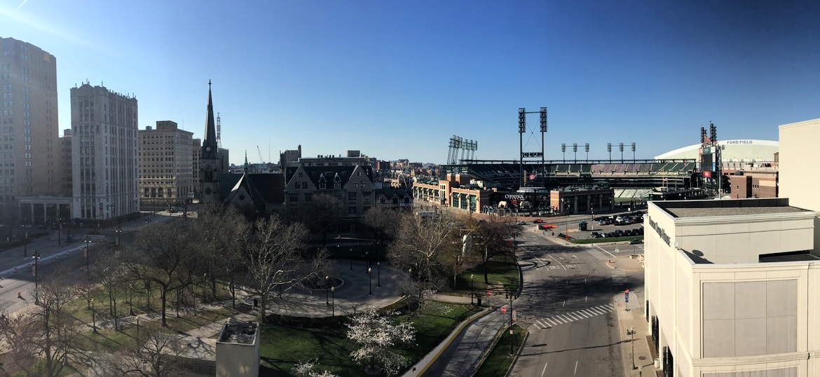 View of Grand Circus Park , the Detroit Opera House , Comerica Park , and Ford Field from the Madison Building rooftop. 