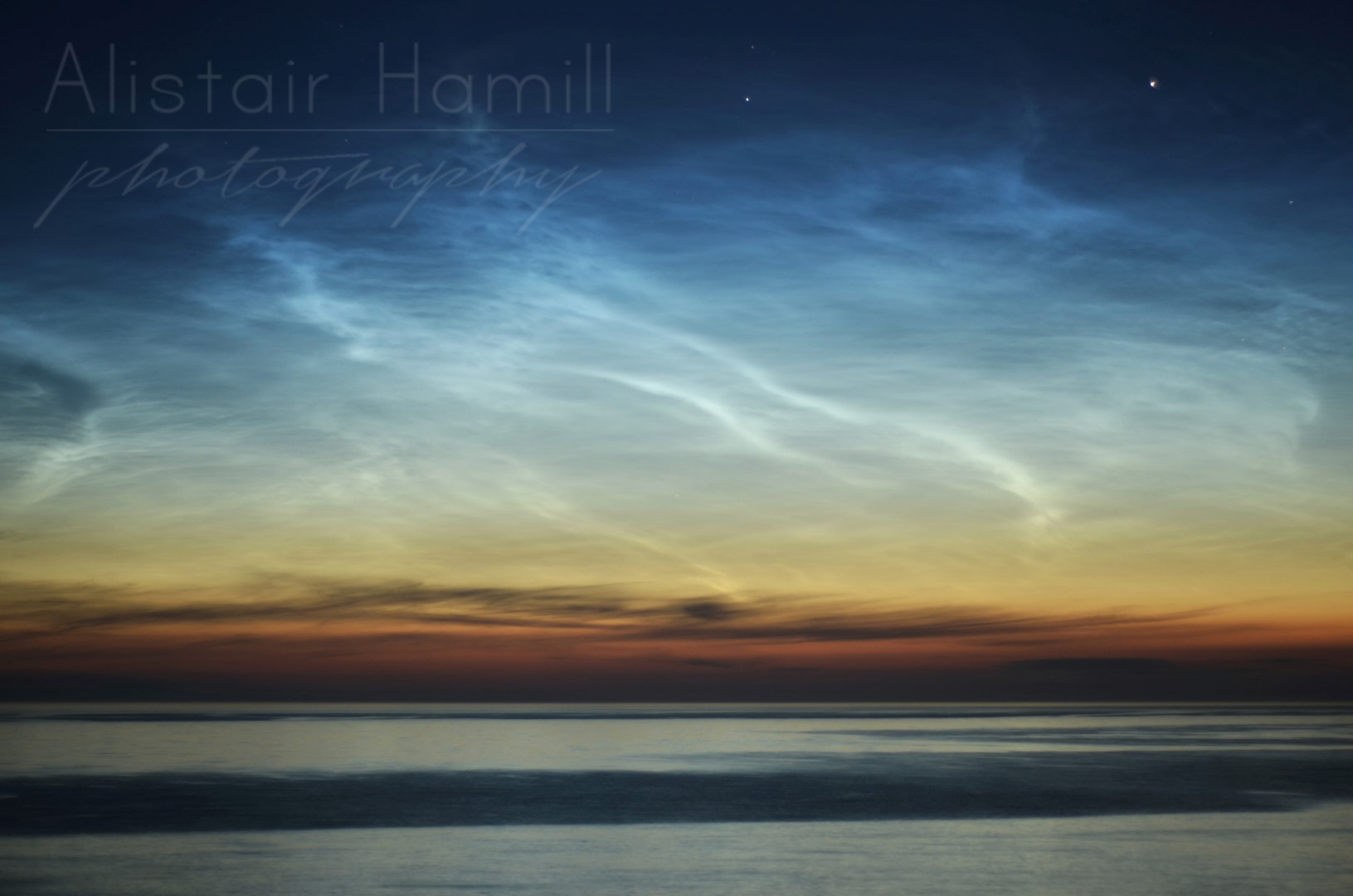 A close up of the beautiful tendrils of the noctilucent clouds