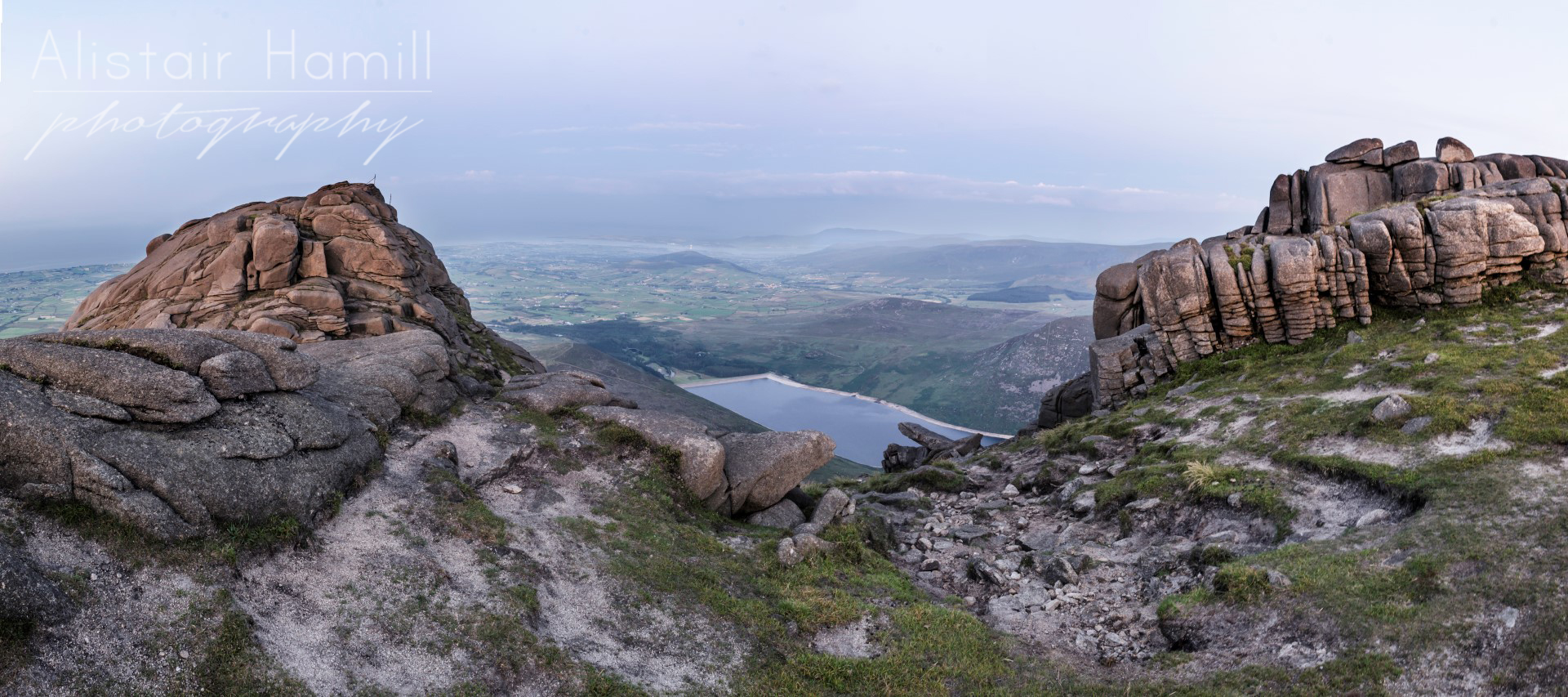 Silent Valley reservoir, as glimpsed from between two of the south tors.