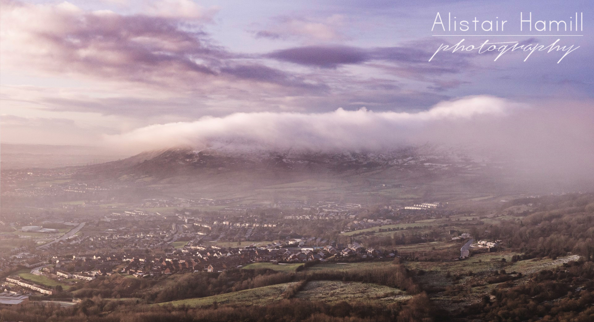 The view towards Divis and Black Mountain, draped in their own cloud, with a fine mist sweeping in from the west