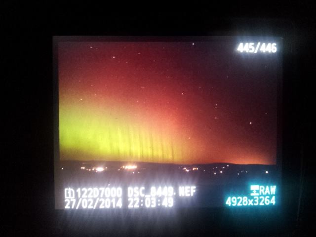A phone shot of what appeared on my camera screen during the February 2014 display. This was only a 2 second exposure on my camera! This exceptional display was more than bright enough to see, even from inside the car with all the dashboard light as we drove north. But even in this case, the colours were not visible to the naked eye.