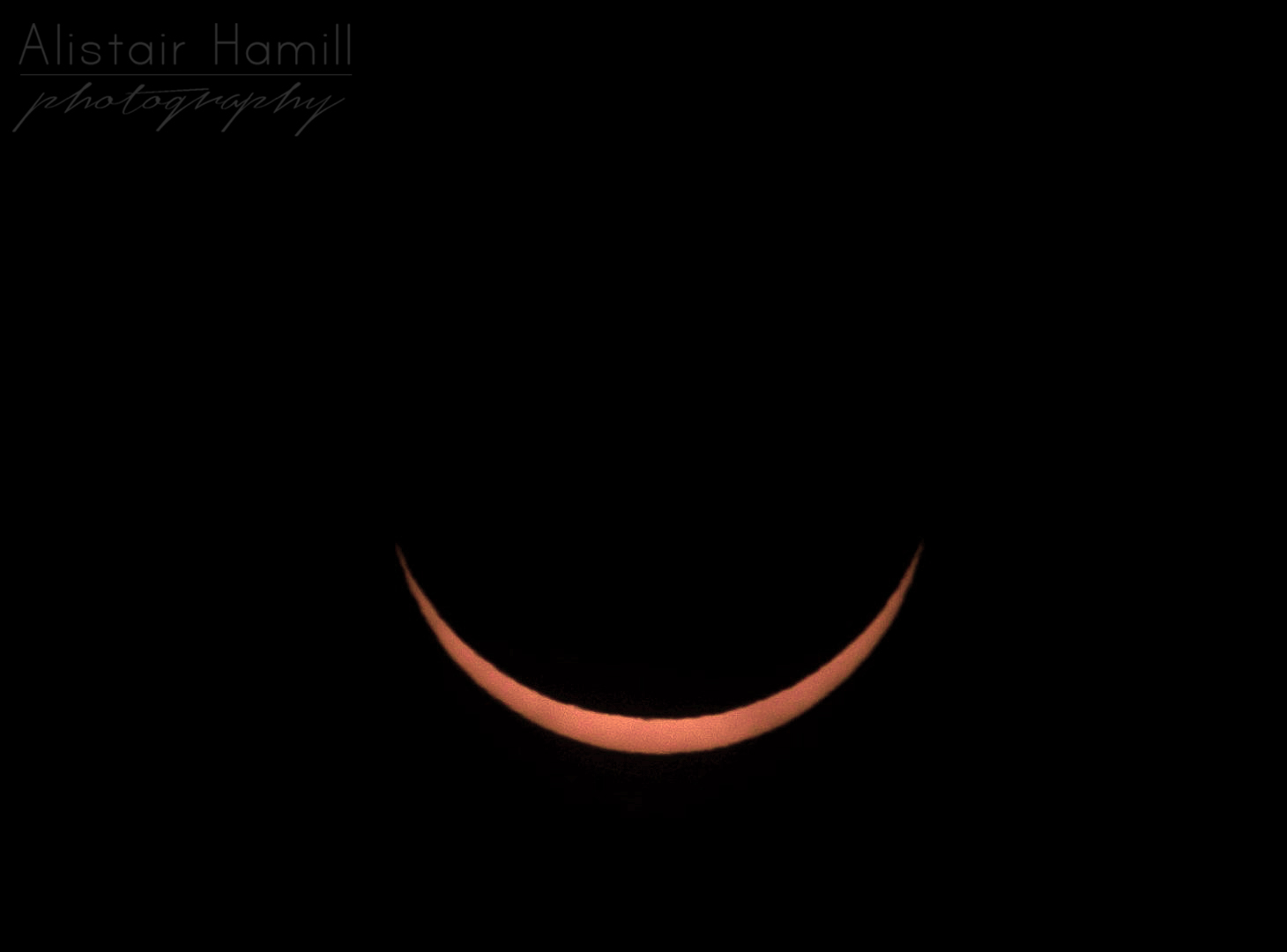 The sun at maximum eclipse, when around 93% of it was cover by the moon's disc, and the sun turned into a smiling emoji with very tightly closed eyes, by all accounts!