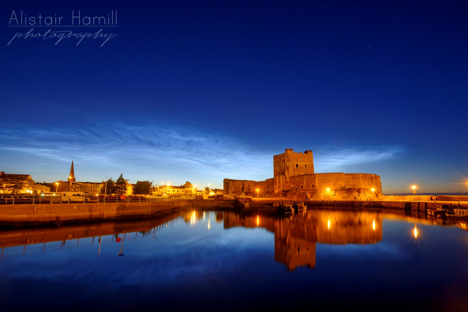 Carrickfergus Castle, a fine 12th century Norman castle located on the shores of Belfast Lough. I was lucky enough to the waters of the harbour to become as still as a mill pond not long after I arrived. Perfect conditions for shooting some NLCs - and their reflections!