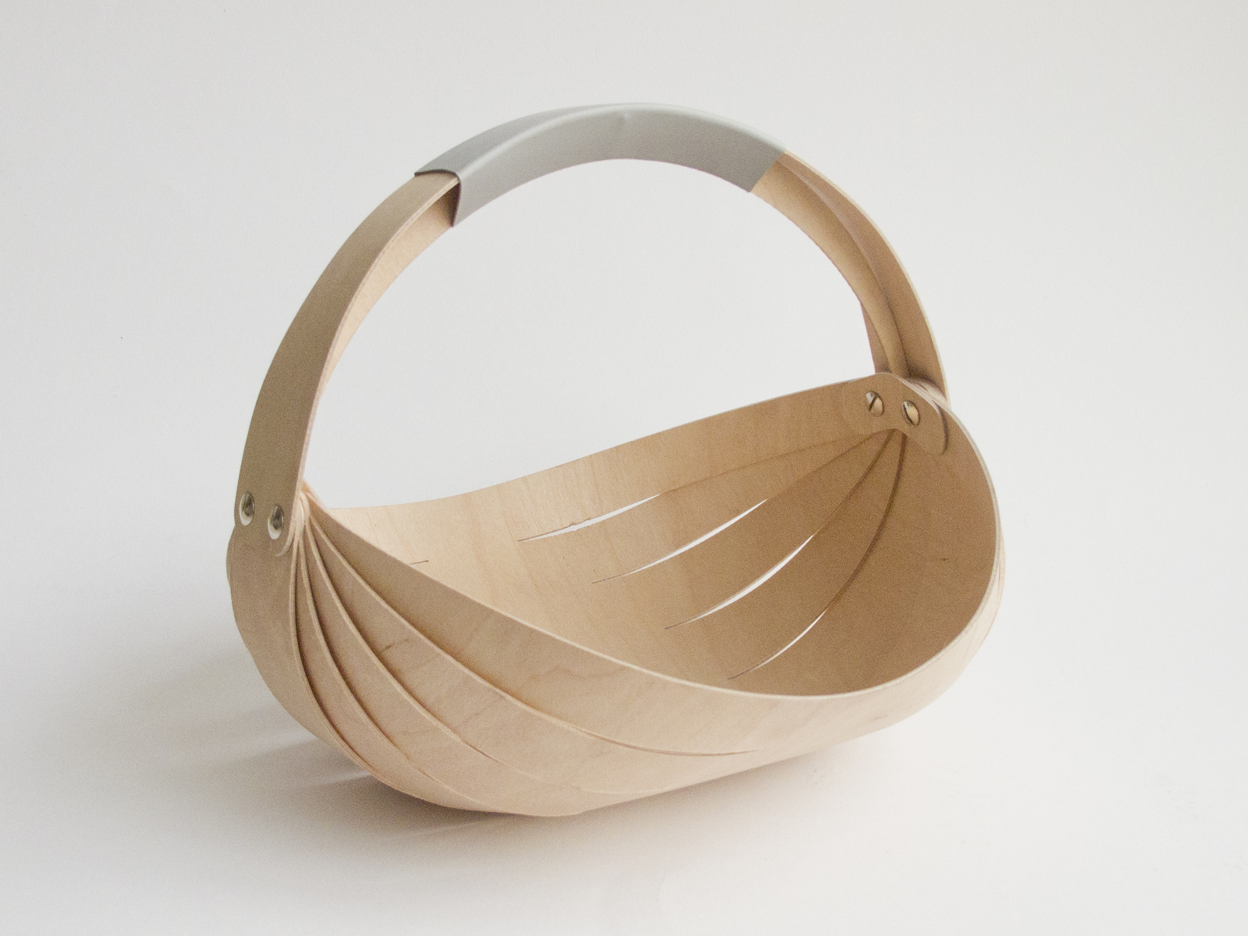 The Flat-pack Trug has been design to fit into an envelope and posted to a customer, who builds it themselves. The supply chain of many modern products necessitates that the object be sold in parts and built by the customer.