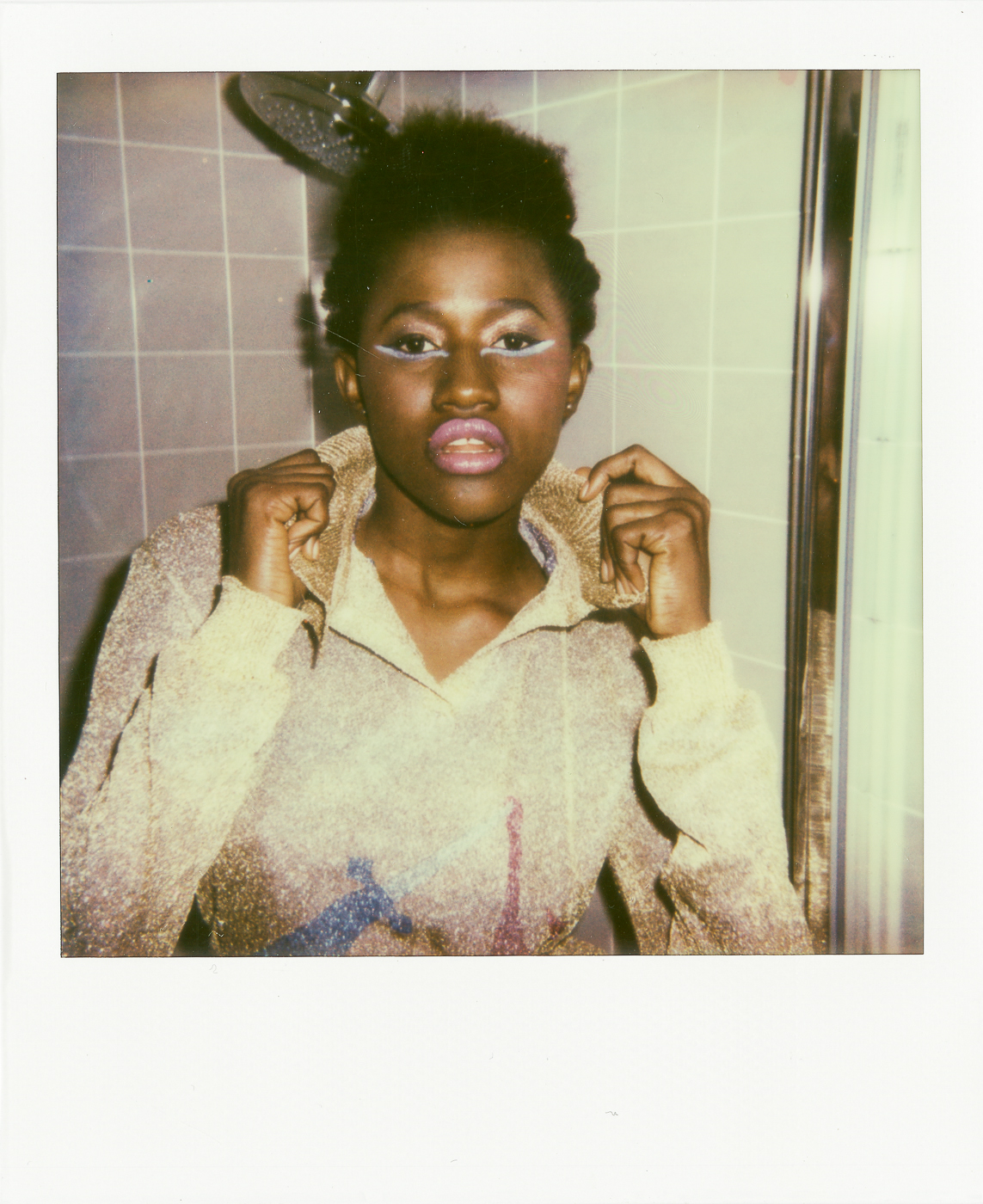  Photos by Aldo Carrera The Polaroids