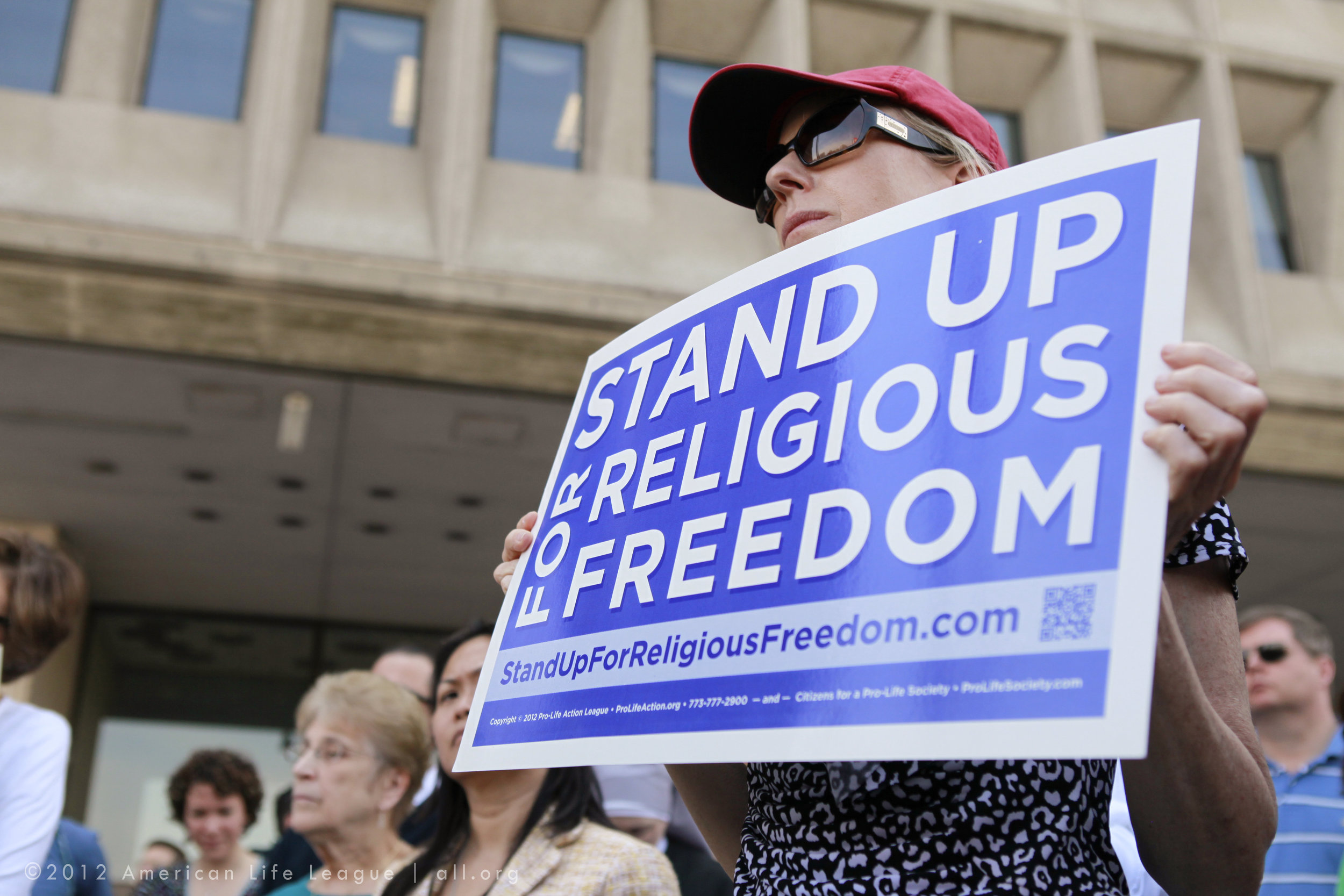Demonstrator at a Stand Up for Religious Freedom Rally. (American Life League/Flickr)