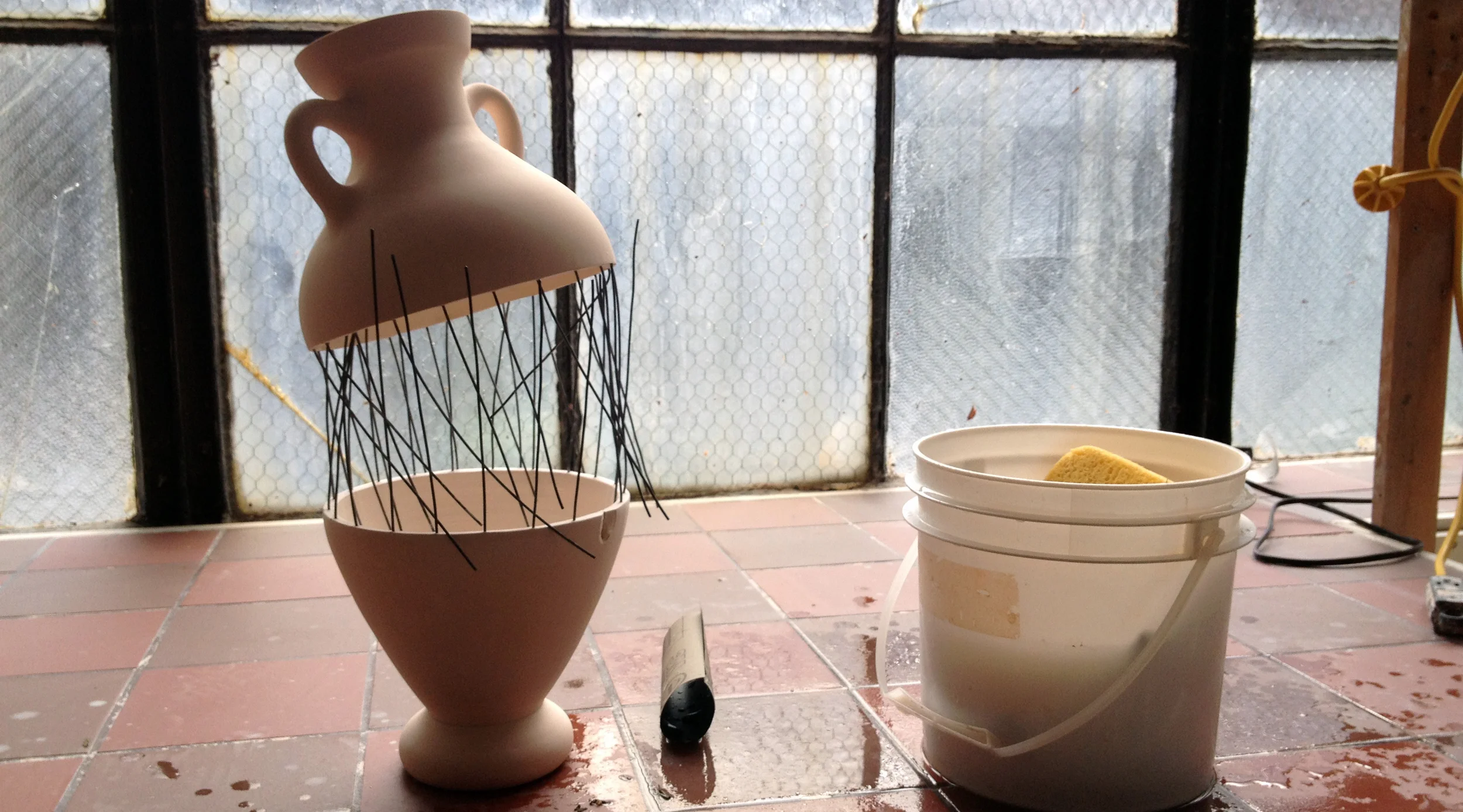 Wetsanding porcelain after bisque firing