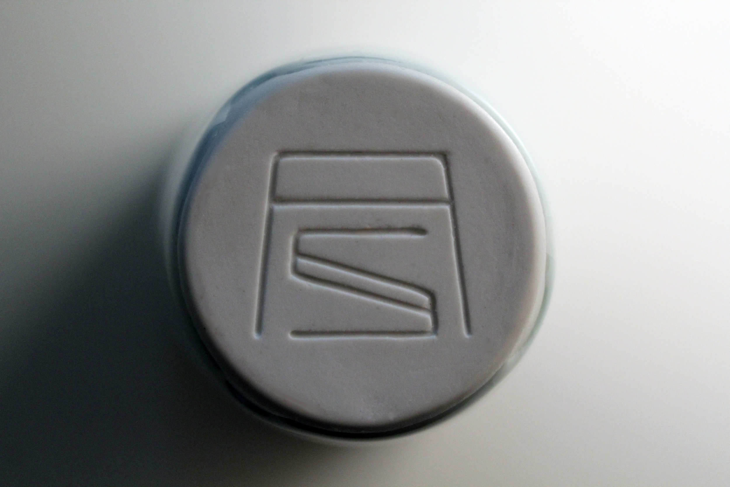 Signature on the bottom of a porcelain cup