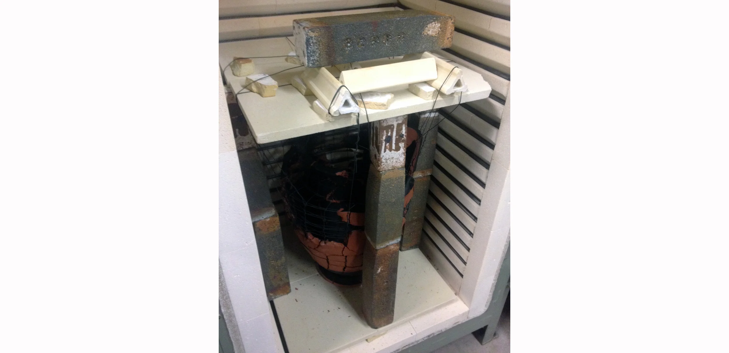 A Volute Krater, suspended in the kiln