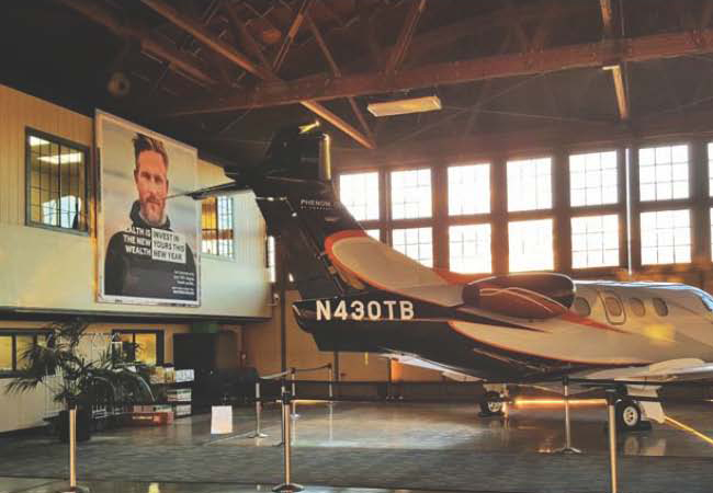 Billboards inside private jet hangars…