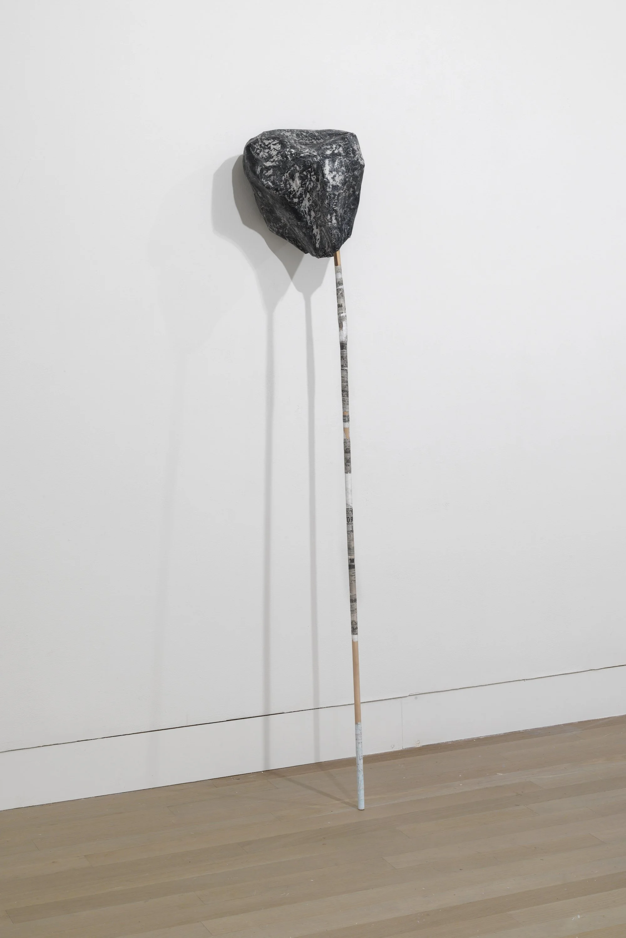 Untitled, 2015, papier-mâché, paint, and wood stick, 67 x 11 x 12 inches
