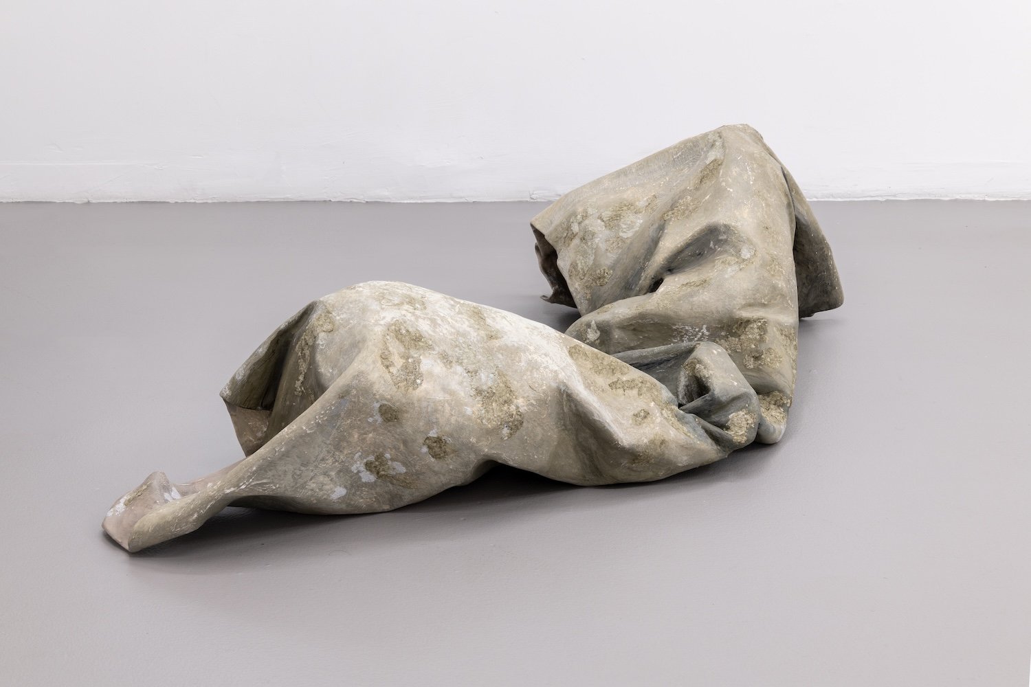 Traces, 2021, papier-mâché, colored pencil, graphite, and paint, 15 x 53 x 16 inches
