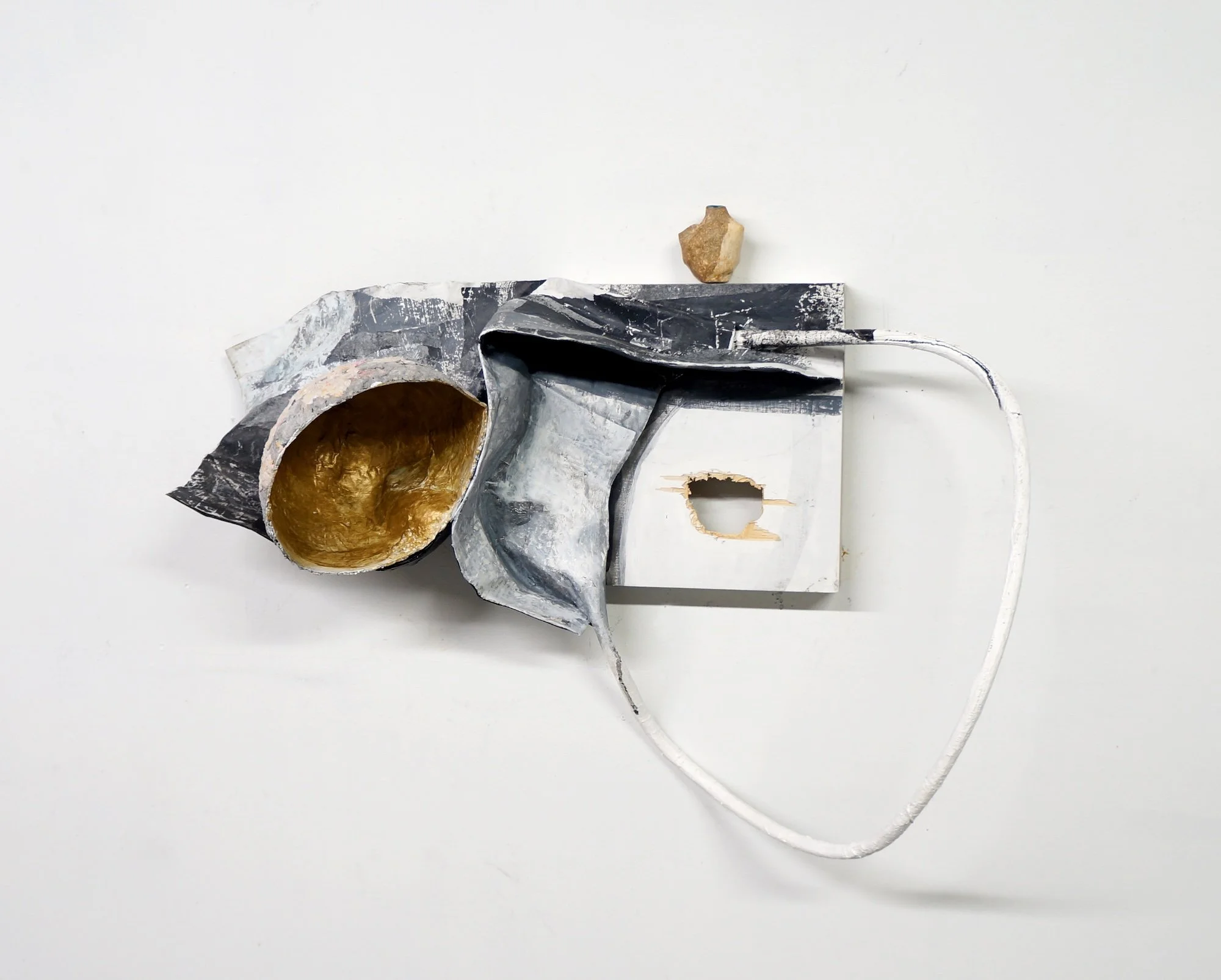 Echoed Rings, 2017, panel, cable, papier-mâché, paint, and ceramic, 19 x 9 x 26 inches