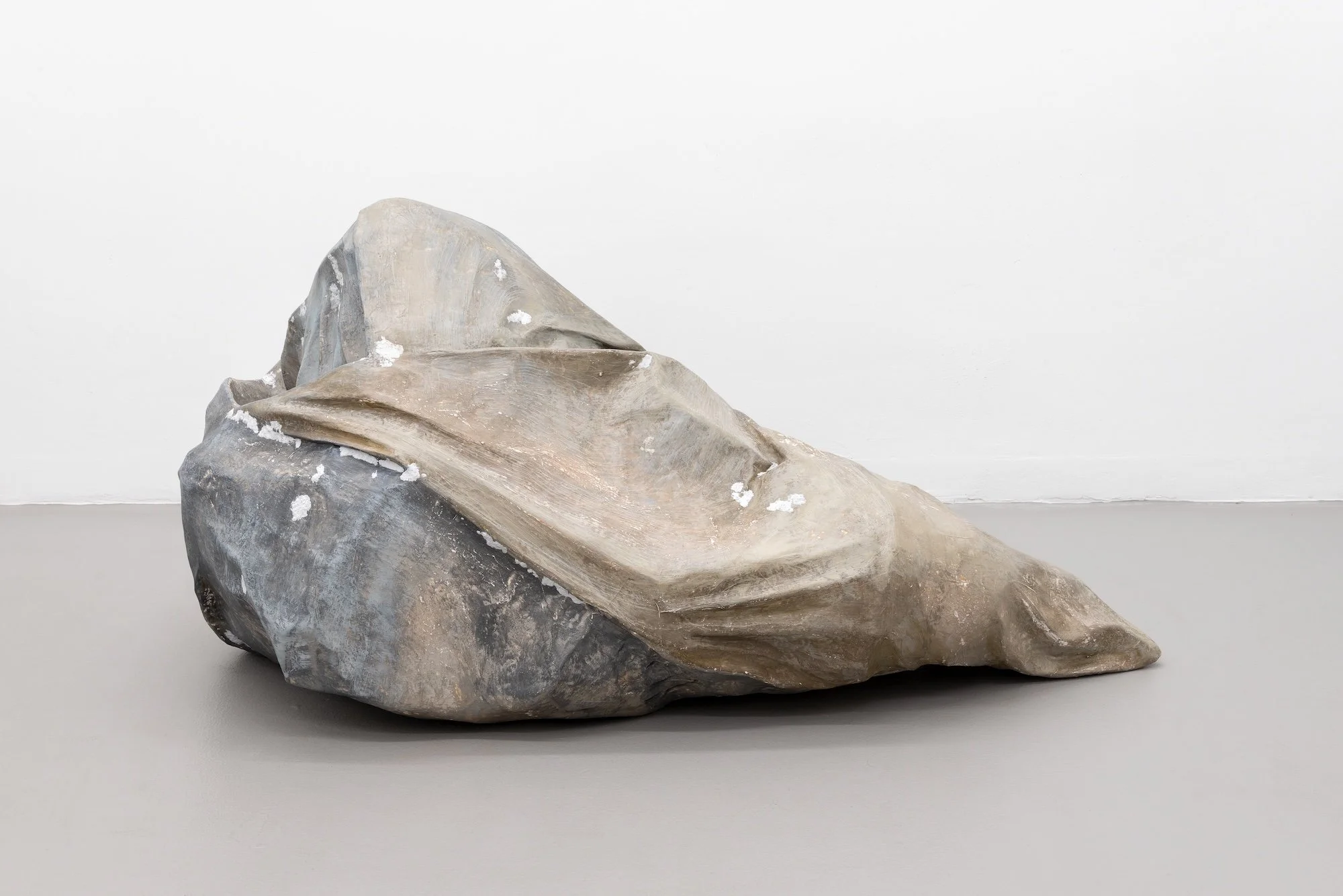 Folding Ground, 2024, papier-mâché, paper clay, PVA, gesso, ink, graphite, and acrylic paint, 19 x 55 x 29 inches
