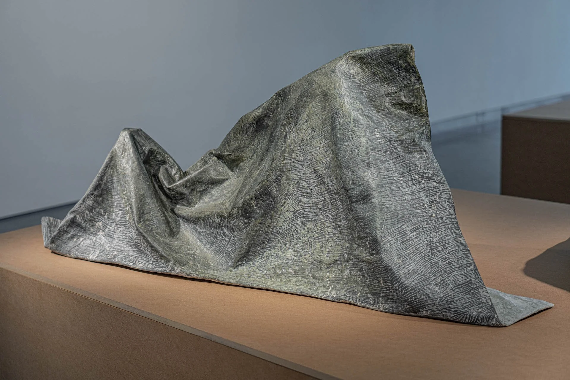 Traces, 2021, papier-mâché, gesso, ink, colored pencil, graphite, and acrylic paint, 20 x 22 x 52 inches