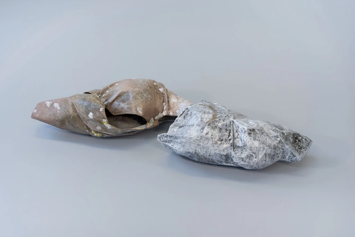 Origin, 2024, Ink, acrylic, graphite, and papier-mâché, 8 x 50 x 19 inches