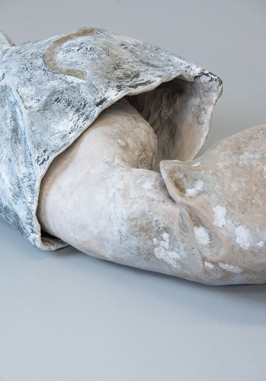 Origin, 2024, Ink, acrylic, graphite, and papier-mâché, 8 x 50 x 19 inches (detail)