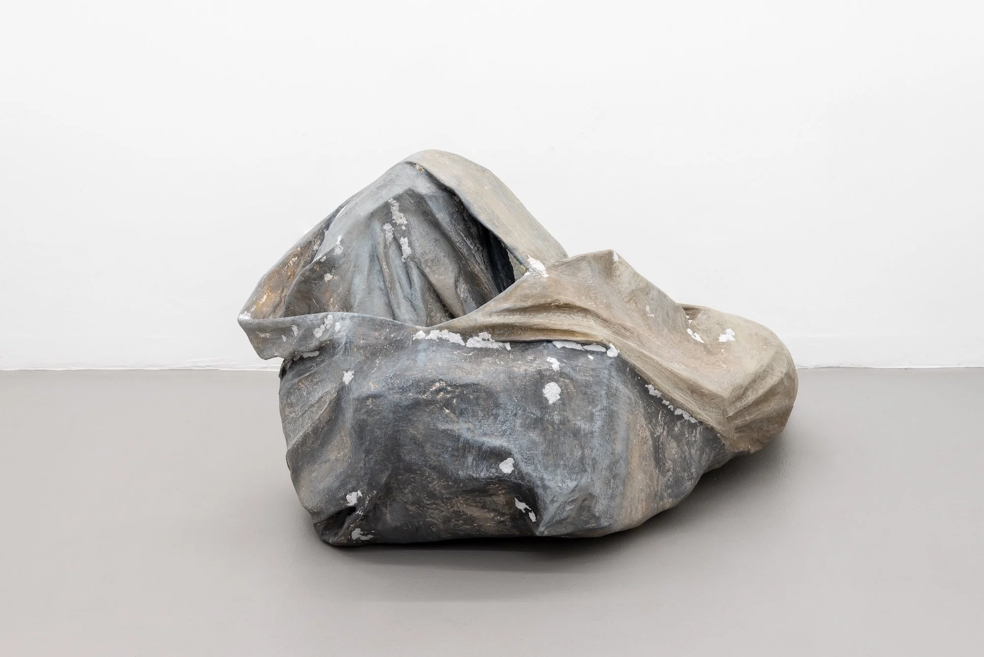 Folding Ground, 2024, papier-mâché, paper clay, PVA, gesso, ink, graphite, and acrylic paint, 19 x 55 x 29 inches
