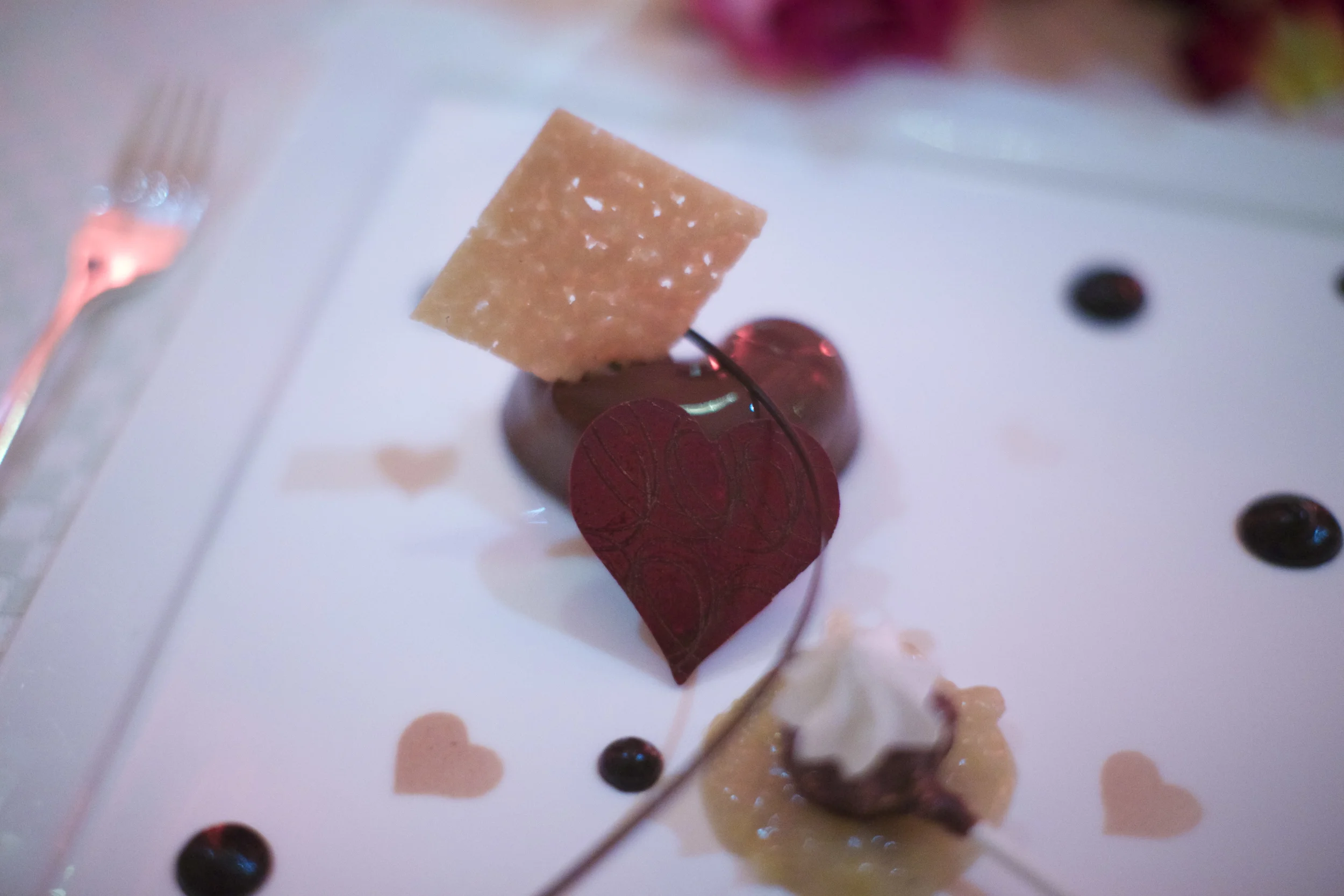 Both of the desserts were very themed, which is always interesting, and very whimsical. This time I took the reigns and ordered the chocolate mousse as fast as I could. This proved to be a good choice. The mousse was creamy, rich, the perfect amount of sweetness, and full of dark chocolatey goodness. The chocolate lollipop was filled with a delicious vanilla cream and the chocolate decorations were nothing less than perfect. I wasn't the biggest fan of the "Pineapple Compotee" pairing, but to each their own. Here's how the menu read: “My heart” Dark chocolate mousse, vanilla cream, pineapple compotee 