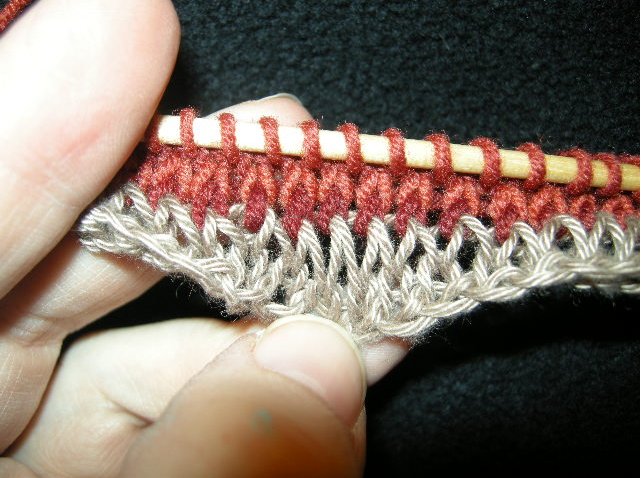 4 rows worked in real yarn. Double-wrapped waste yarn row creates elongated waste stitches.