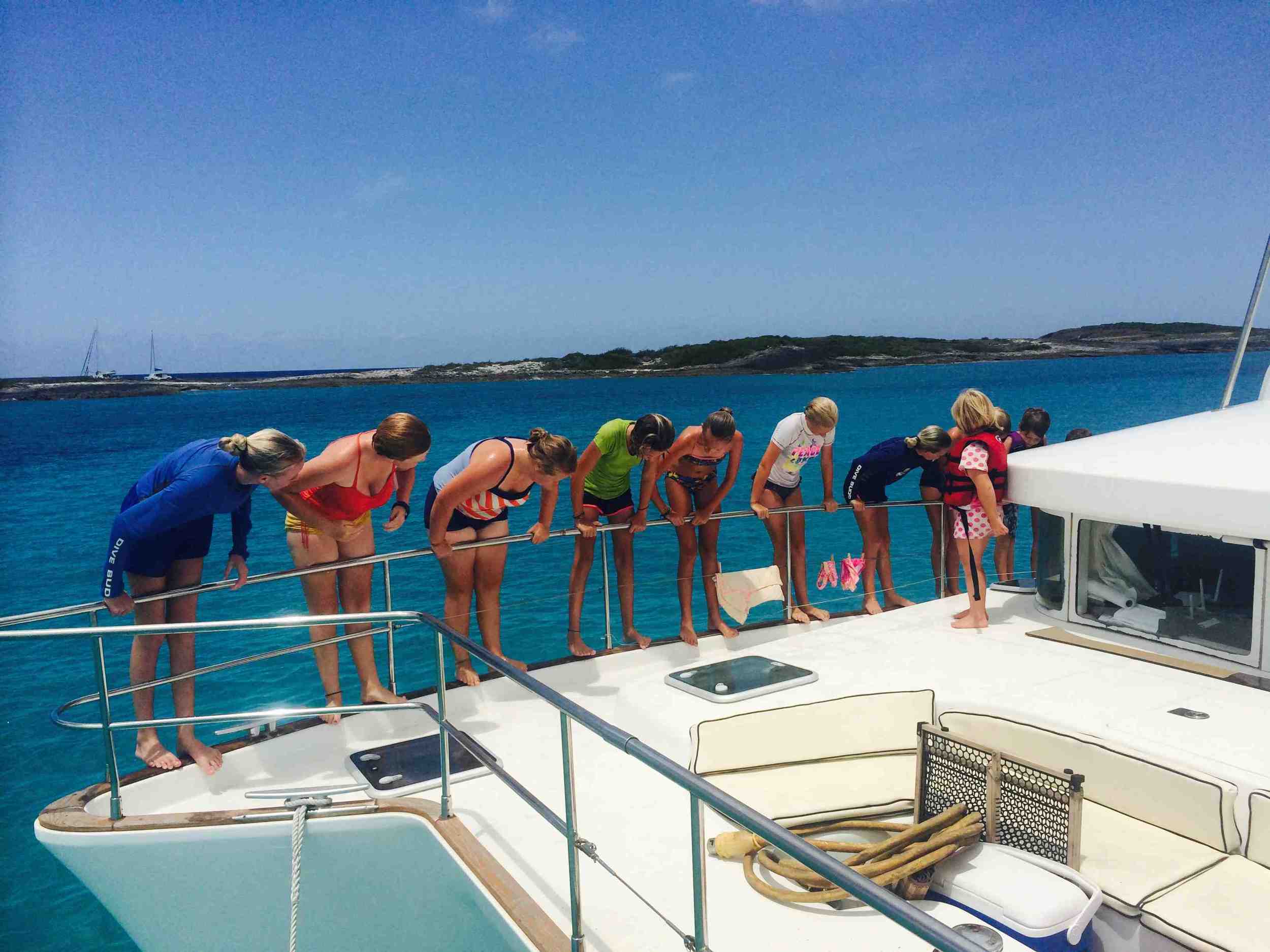  A row of boat kids 