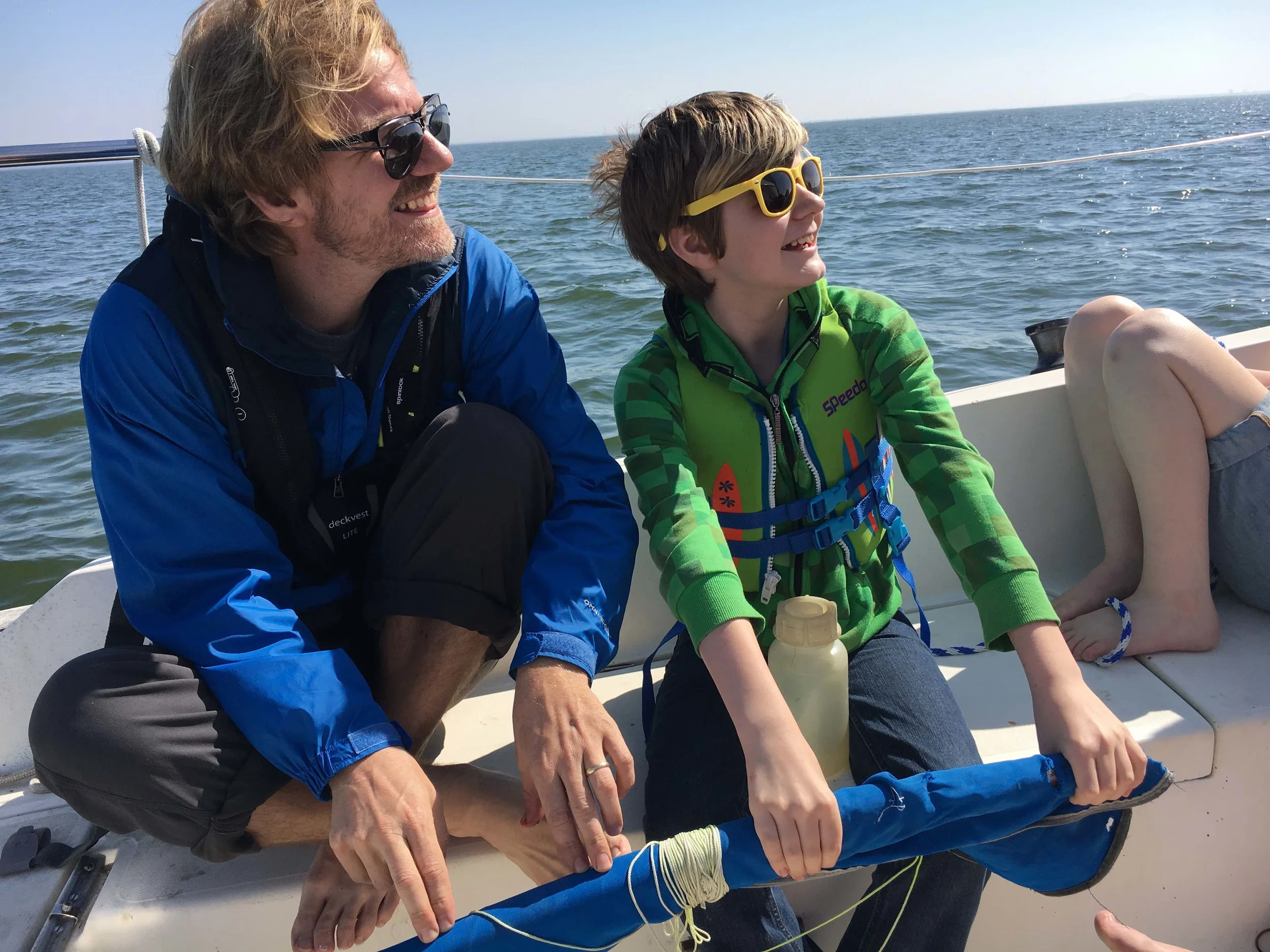 Eli's enjoys sailing more when he has the tiller