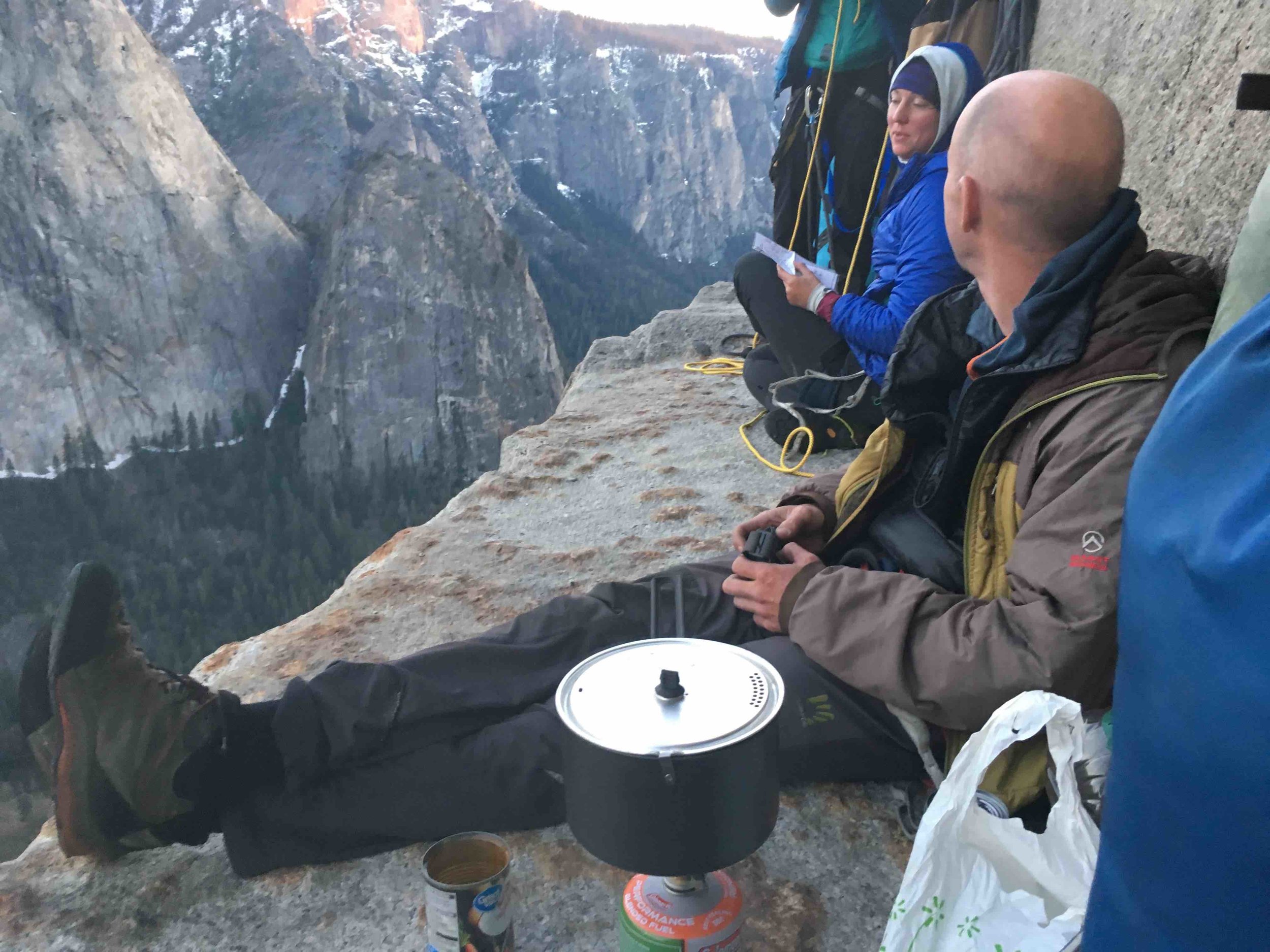 Josh heating up dinner. Rebecca and Andrea were climbing the same route.