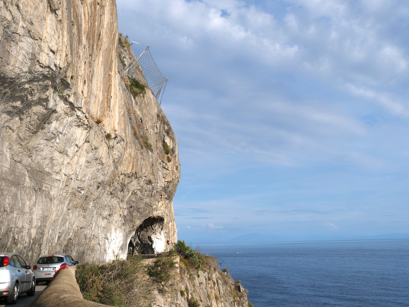  Cutting into a cliffside tunnel on the Amalfi Coast. 