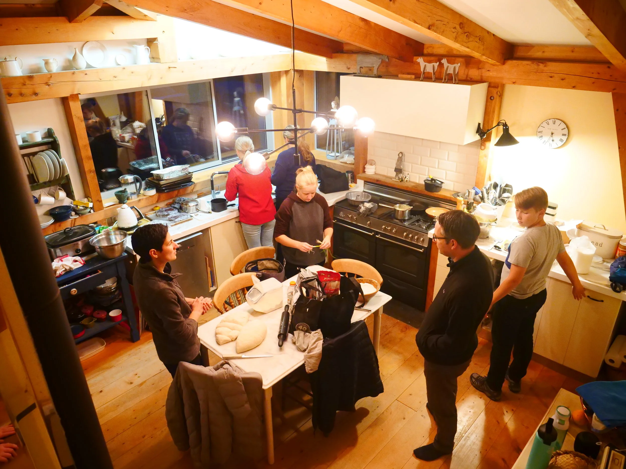 Cooking in the kitchen with friends.
