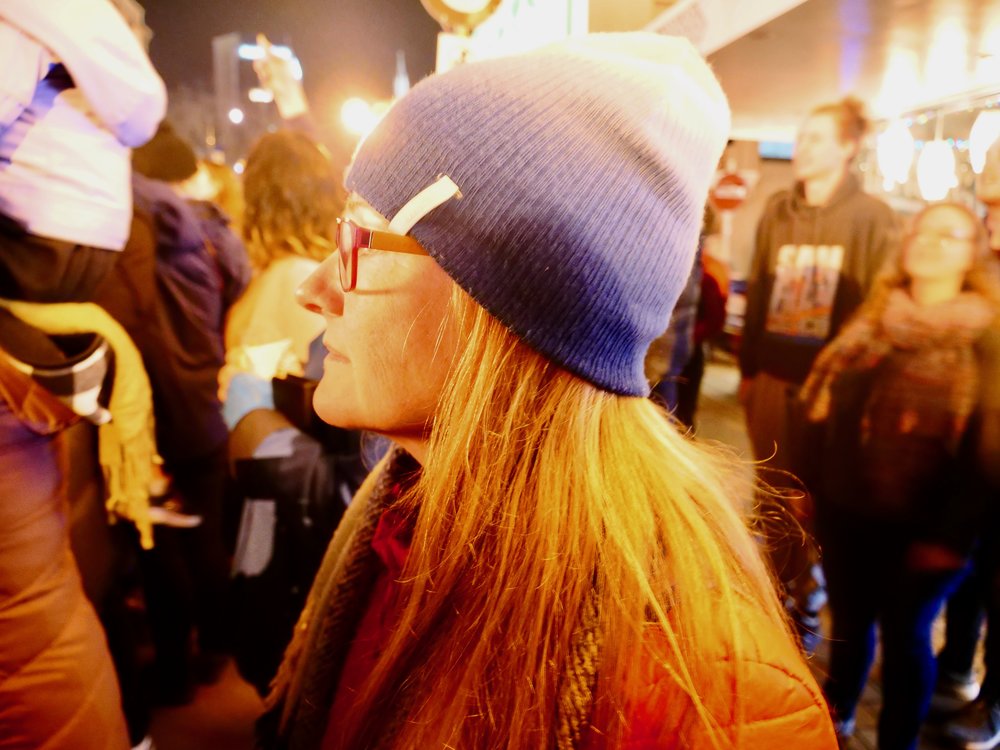 Emily watching the fire dancers at the Midwinter Festival.