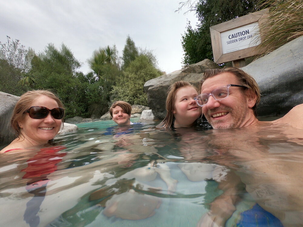 Cozy family soaking