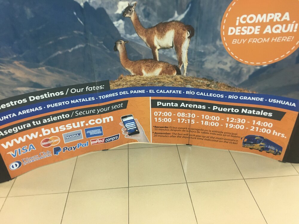 Sign in the Punta Arenas airports for buses going directly to Puerto Natales. (I love the mistranslation on the top left: “ our destinations” translated as “our fates.” Choose wisely : )