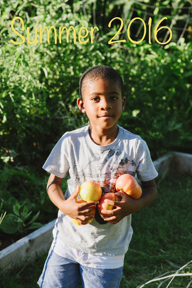 Marcus has a simple expression on his face after I told him to bring in the tomatoes from our garden. This shot is one of my favorite out of many. He is growing up so quickly and I have to savor little moments like this. 