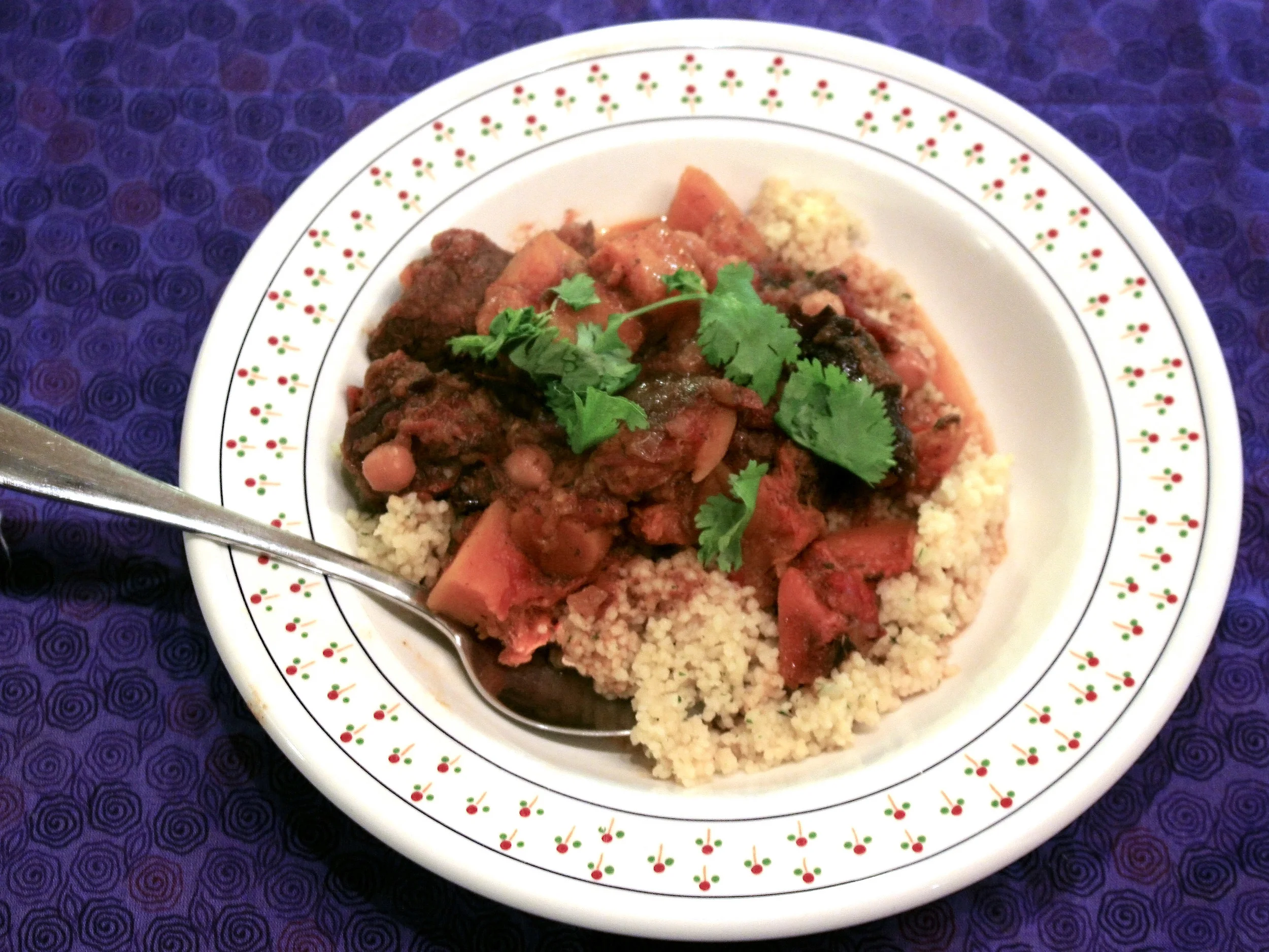 This is a very satisfying winter dish. The squash held it's shape but also helped thicken the sauce. The ras el hanout spice mix gives the dish a complex, smokey flavor. If you don't have a Moroccan grocery nearby, here's a recipe for the spice mix .